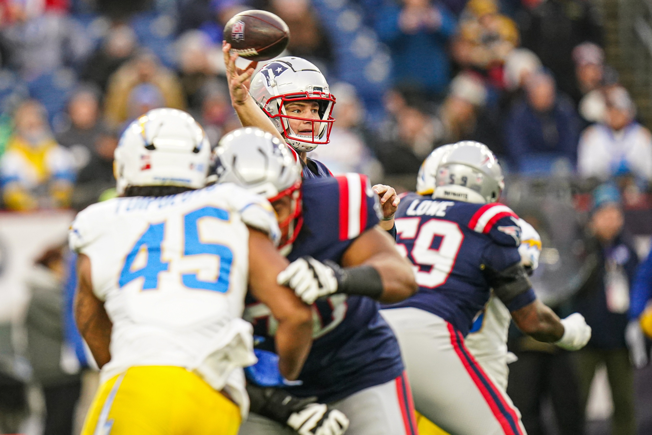 Dec 28, 2024; Foxborough, Massachusetts, USA; New England Patriots quarterback Drake Maye (10) passes the ball against the Los Angeles Chargers in the second half at Gillette Stadium. Mandatory Credit: David Butler II-Imagn Images