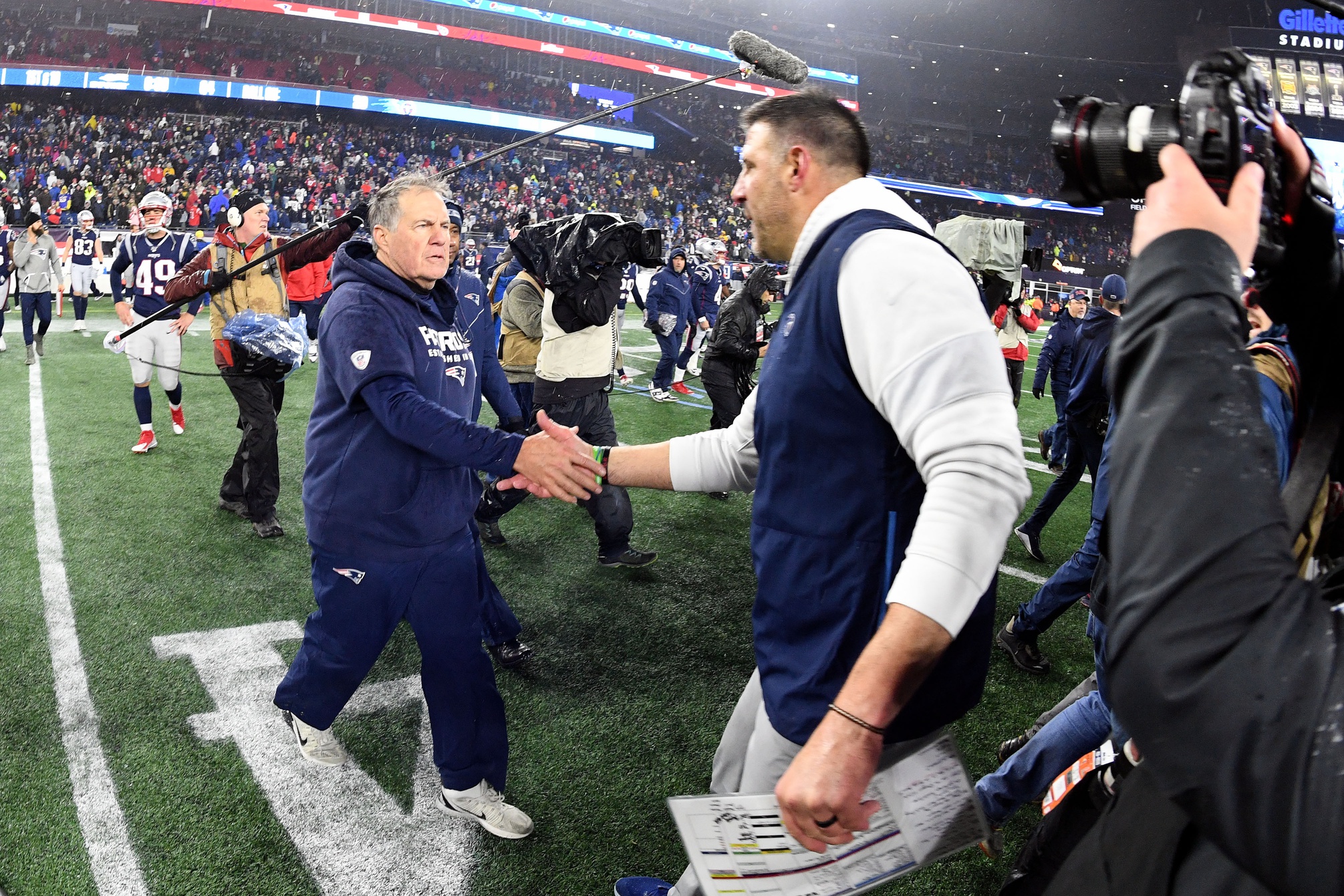 Jan 4, 2020; Foxborough, Massachusetts, USA; New England Patriots head coach Bill Belichick shakes hands with Tennessee Titans head coach Mike Vrabel after the Patriots lost to the Titans at Gillette Stadium. Mandatory Credit: Brian Fluharty-USA TODAY Sports