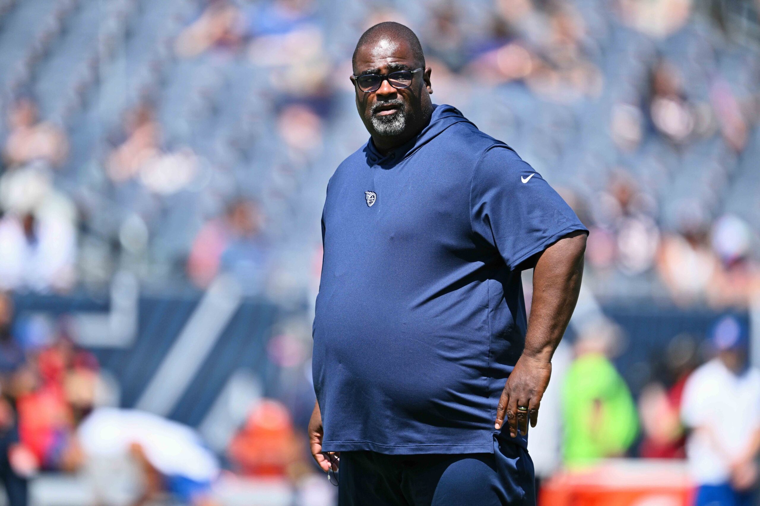 Aug 12, 2023; Chicago, Illinois, USA; Tennessee Titans assistant head coach Terrell Williams watches his team warm up before a game against the Chicago Bears at Soldier Field. Mandatory Credit: Jamie Sabau-USA TODAY Sports