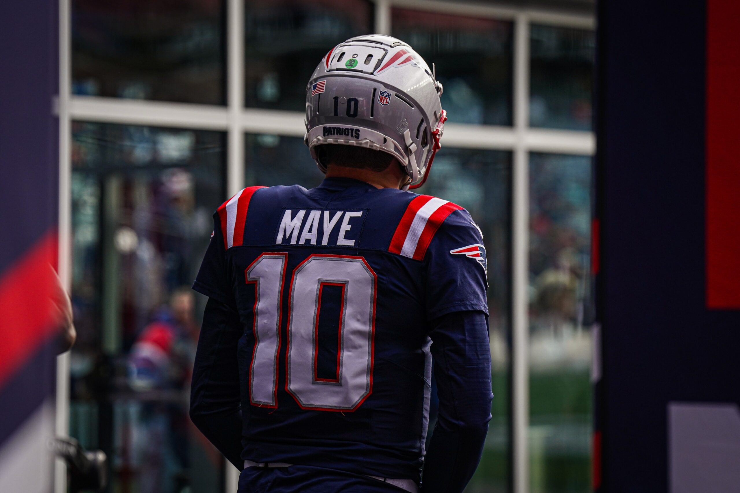 Jan 5, 2025; Foxborough, Massachusetts, USA; New England Patriots quarterback Drake Maye (10) walks to the field to warm up before the start of the game against the Buffalo Bills at Gillette Stadium. Mandatory Credit: David Butler II-Imagn Images