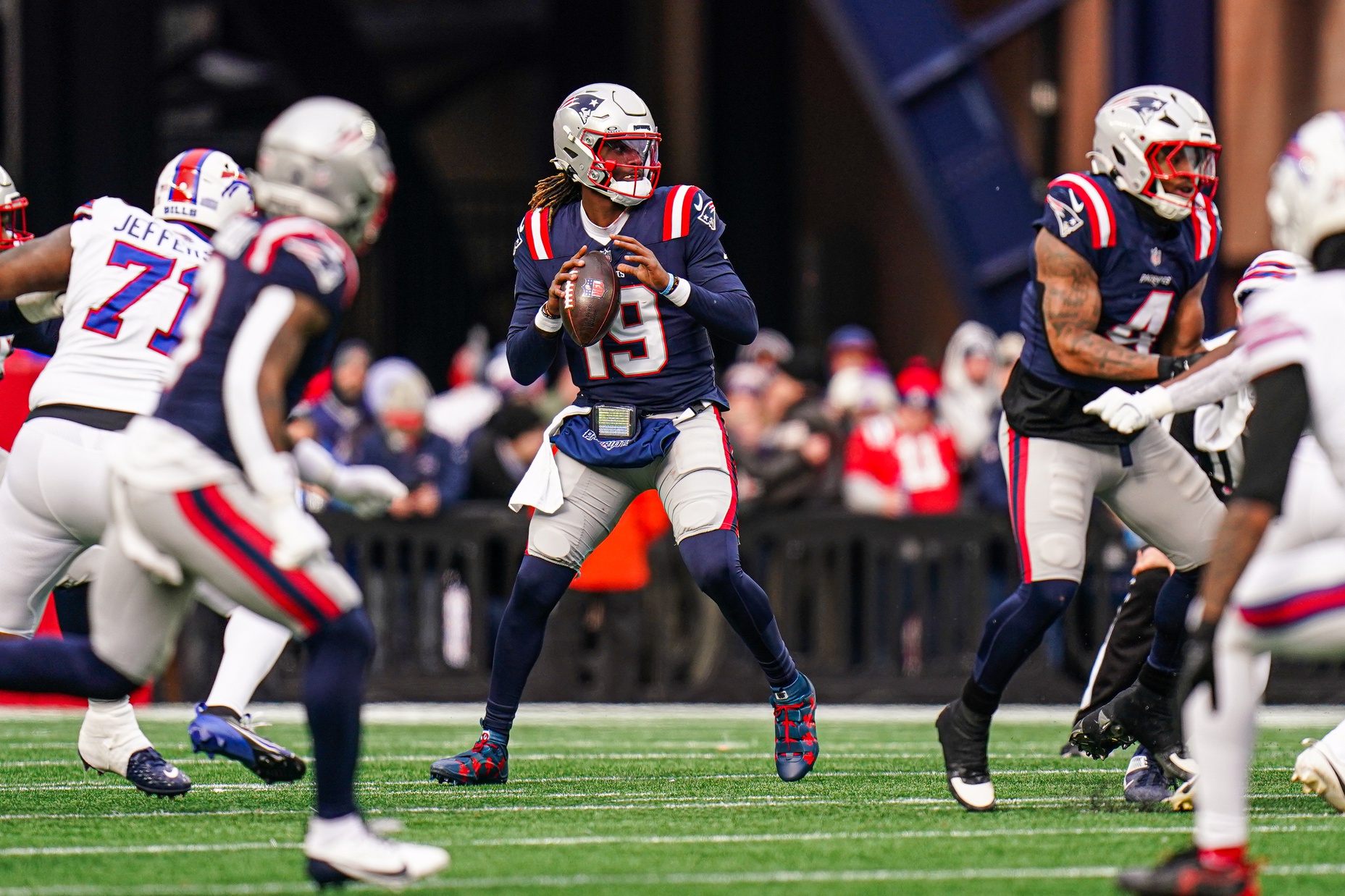 Jan 5, 2025; Foxborough, Massachusetts, USA; New England Patriots quarterback Joe Milton III (19) throws a pass against the Buffalo Bills in the first half at Gillette Stadium. Mandatory Credit: David Butler II-Imagn Images