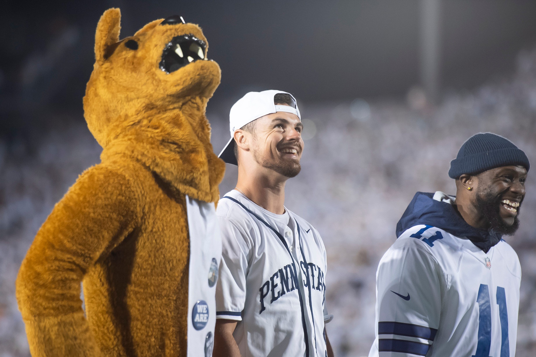 Penn State letterman Trace McSorely (center) smiles as some of his career highlights are played on the video board during a White Out game against Minnesota at Beaver Stadium on Saturday, Oct. 22, 2022, in State College.

Hes Dr 102222 Whiteout