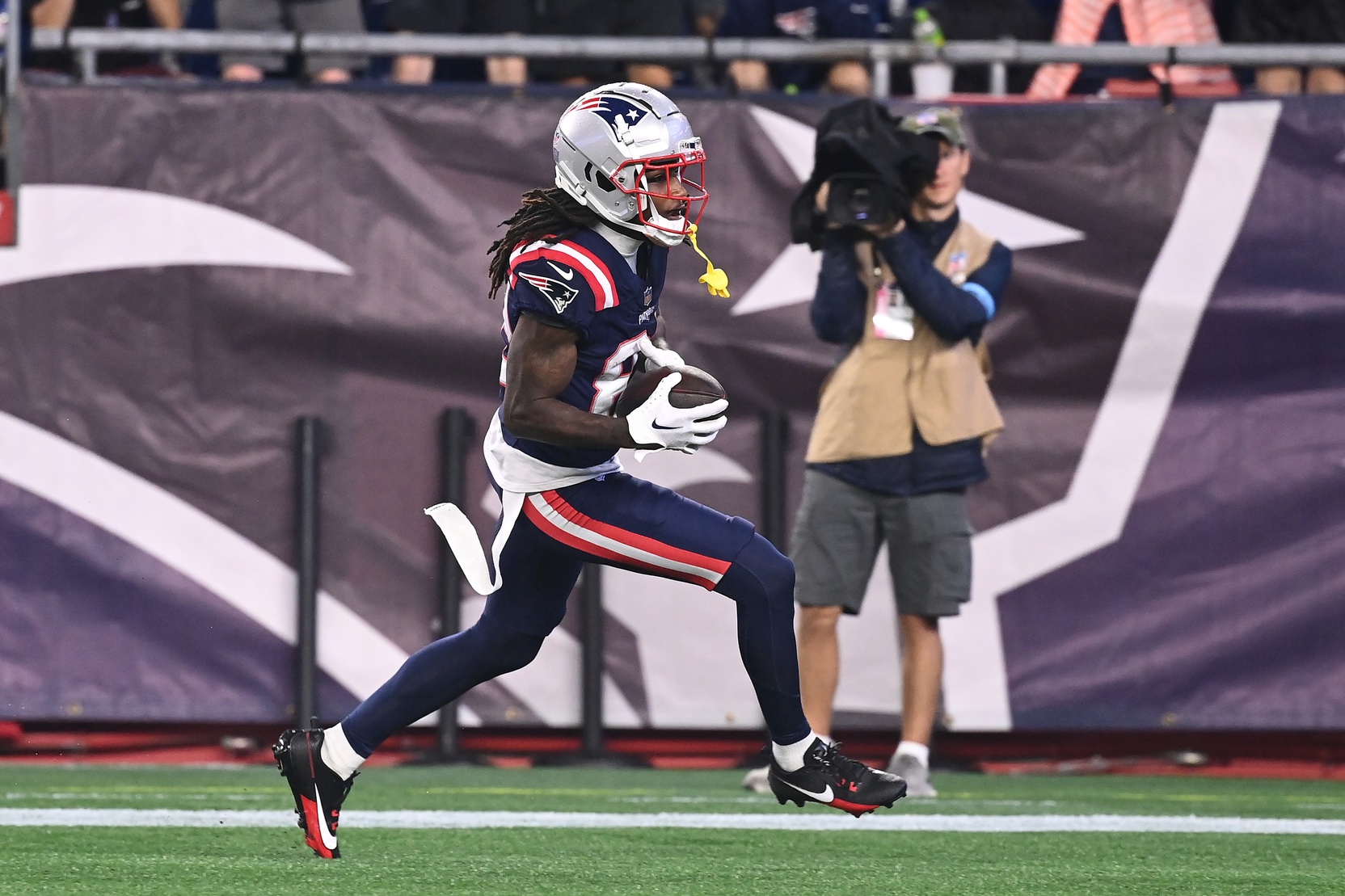August 8, 2024; Foxborough, MA, USA;  New England Patriots wide receiver JaQuae Jackson (82) scores a touchdown against the Carolina Panthers during the second half at Gillette Stadium. Mandatory Credit: Eric Canha-USA TODAY Sports