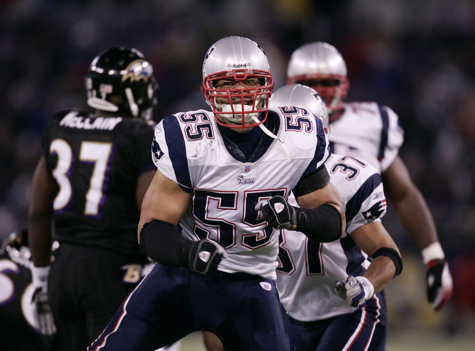 Dec 3, 2007; Baltimore, MD, USA; New England Patriots linebacker Junior Seau (55) reacts after making a tackle in the second quarter against the Baltimore Ravens at M&T Bank Stadium.  Mandatory Credit: James Lang-USA TODAY Sports