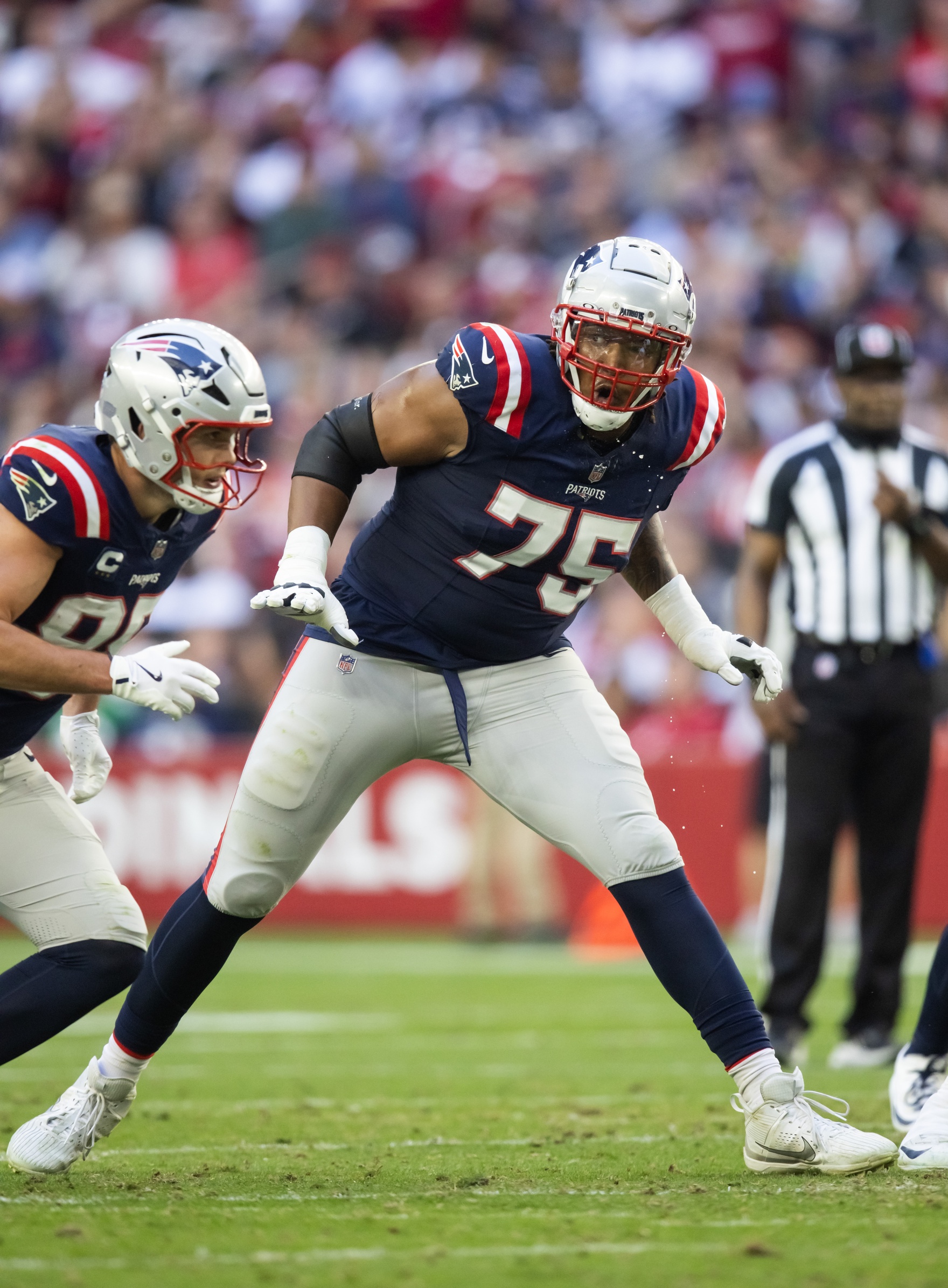 Dec 15, 2024; Glendale, Arizona, USA; New England Patriots offensive tackle Demontrey Jacobs (75) against the Arizona Cardinals at State Farm Stadium. Mandatory Credit: Mark J. Rebilas-Imagn Images