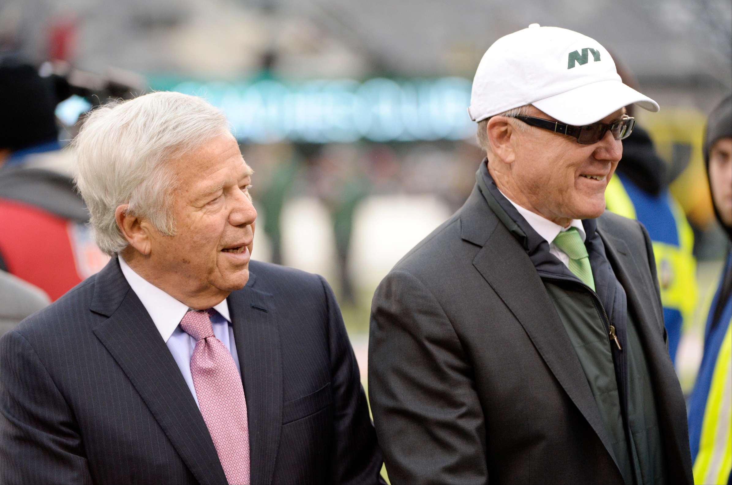Dec 21, 2014; East Rutherford, NJ, USA; New York Jets owner Woody Johnson (right) greets New England Patriots owner Robert Kraft before the game at MetLife Stadium. Mandatory Credit: Robert Deutsch-USA TODAY Sports