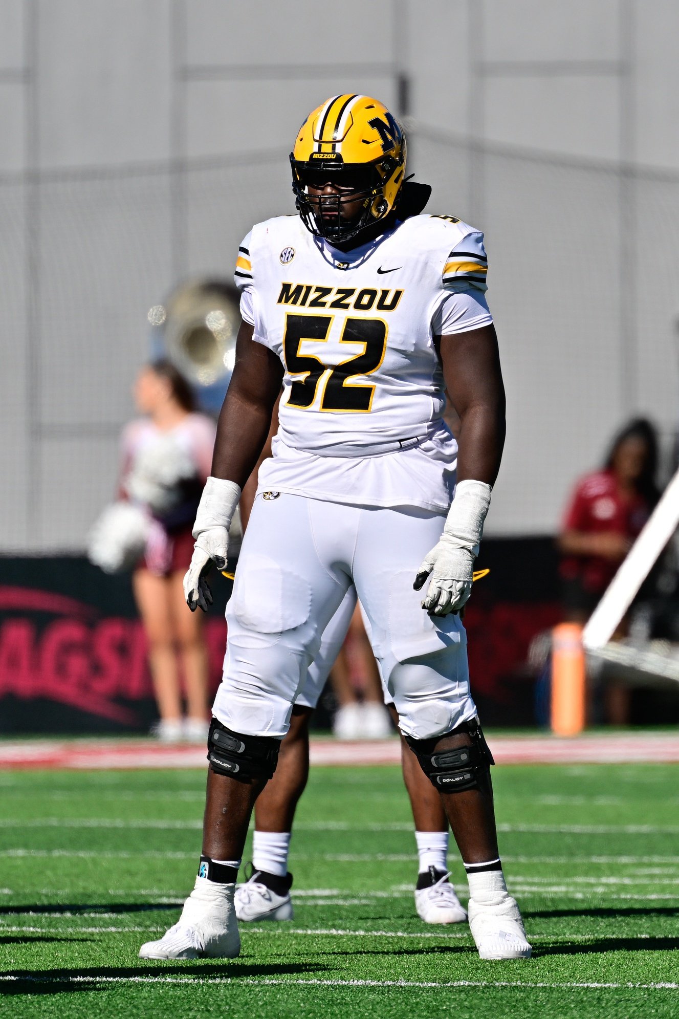 Oct 12, 2024; Amherst, Massachusetts, USA; Missouri Tigers offensive lineman Marcus Bryant (52) at the line of scrimmage during the first half against the Missouri Tigers at Warren McGuirk Alumni Stadium. Mandatory Credit: Eric Canha-Imagn Images