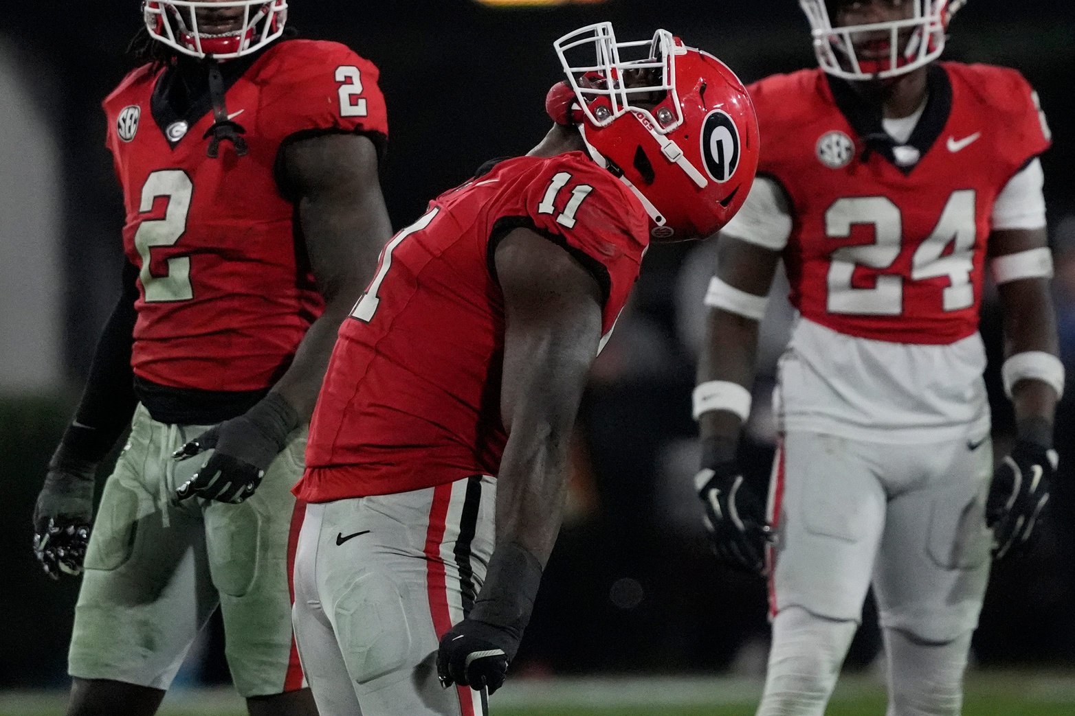 Georgia linebacker Jalon Walker (11) celebrates after sacking Tennessee quarterback Nico Iamaleava (8) during the second half of a NCAA college football game against Tennessee in Athens, Ga., on Saturday, Nov. 16, 2024.
