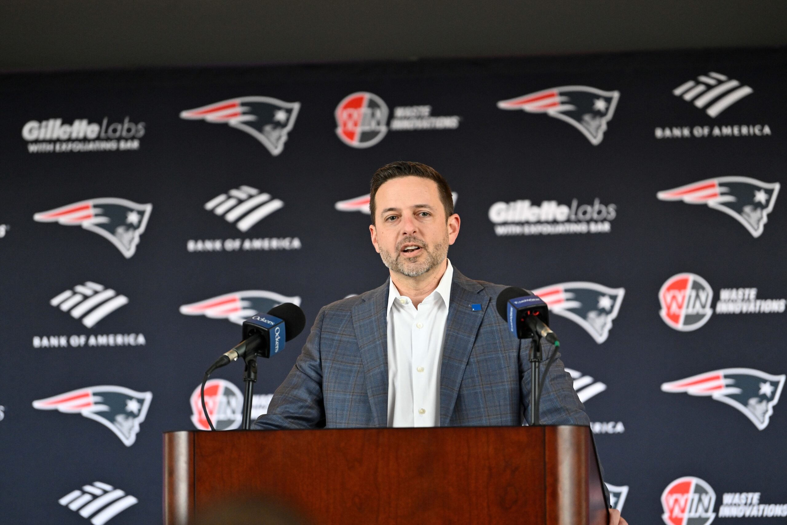 Mar 13, 2025; Foxborough, MA, USA; New England Patriots executive vice president of player personnel Eliot Wolf discusses the teams recent free agent additions with the media at Gillette Stadium. Mandatory Credit: Eric Canha-Imagn Images