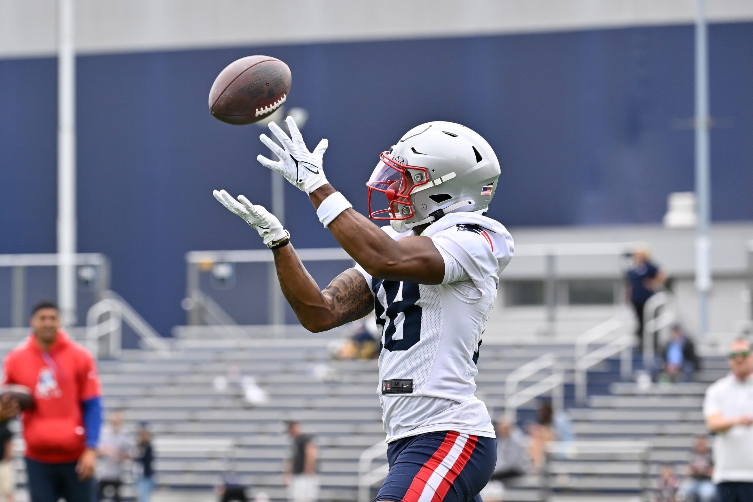 Jun 9, 2025; Foxborough, MA, USA; New England Patriots wide receiver Kyle Williams (18) makes a catch during minicamp at Gillette Stadium. Mandatory Credit: Eric Canha-Imagn Images