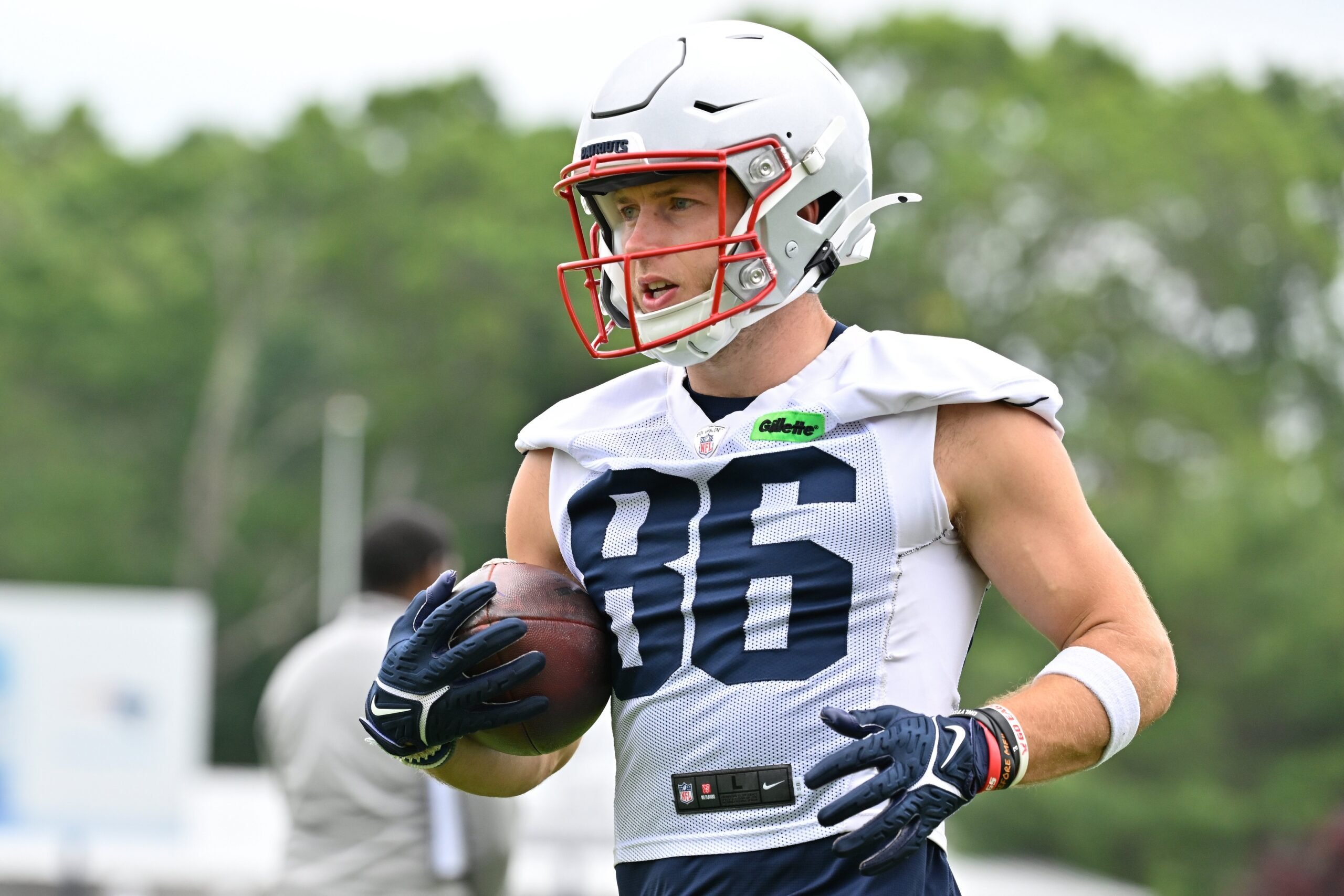 Jun 9, 2025; Foxborough, MA, USA; New England Patriots wide receiver Efton Chism III (86) runs the ball after the catch during minicamp at Gillette Stadium. Mandatory Credit: Eric Canha-Imagn Images
