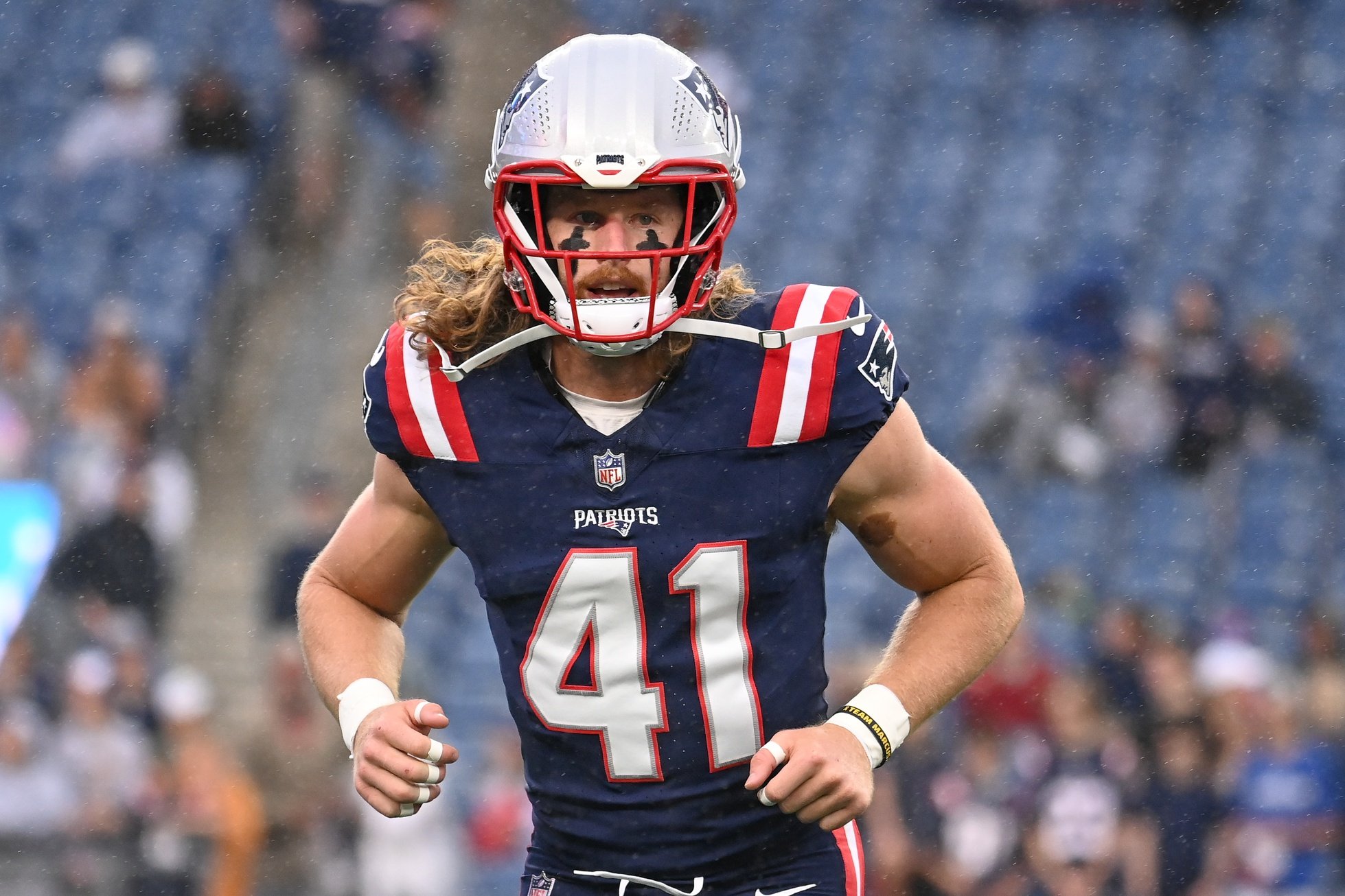 August 8, 2024; Foxborough, MA, USA;  New England Patriots safety Brenden Schooler (41) warms up before a game against the Carolina Panthers at Gillette Stadium. Mandatory Credit: Eric Canha-USA TODAY Sports