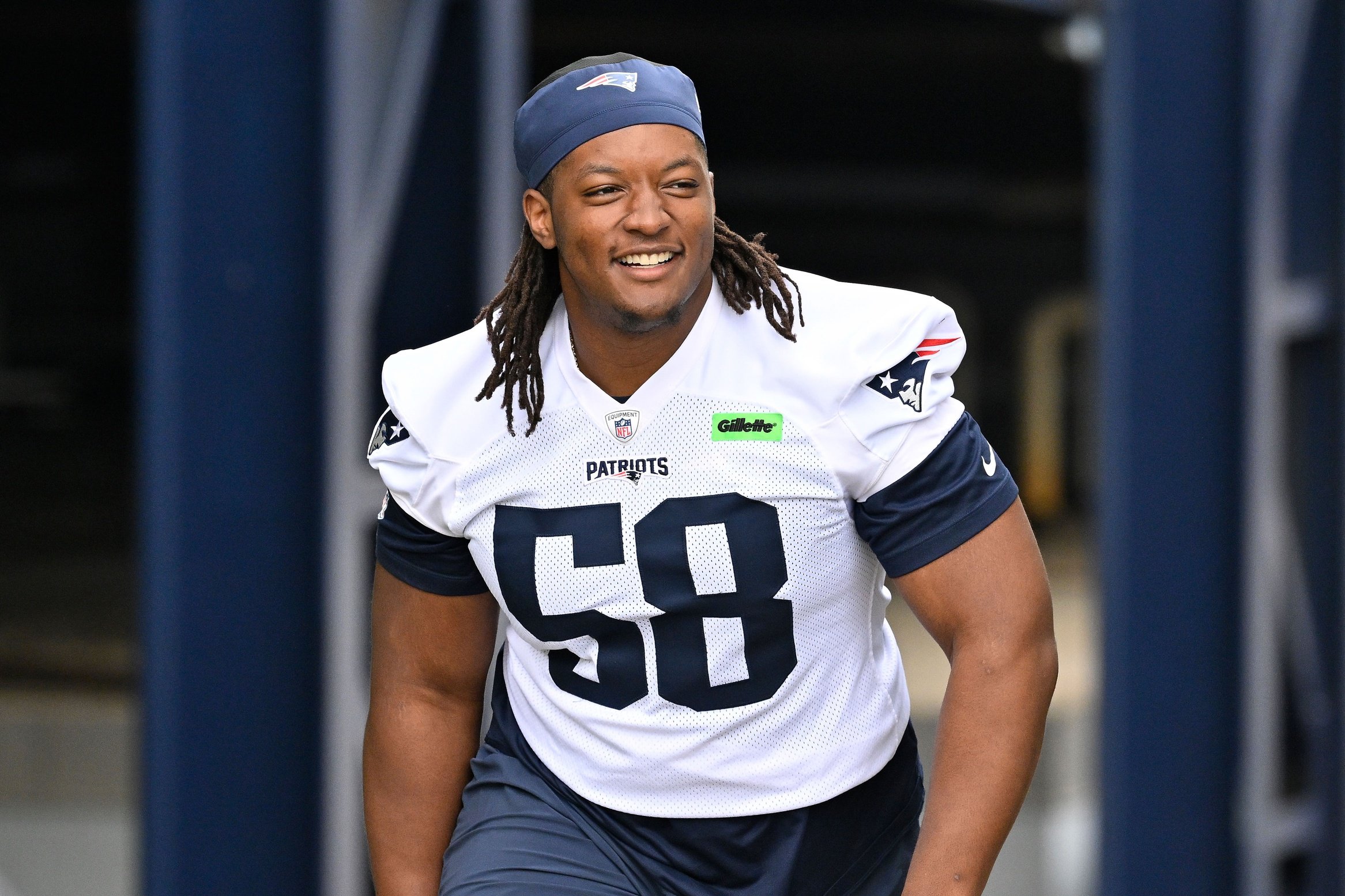 Jun 9, 2025; Foxborough, MA, USA; New England Patriots center Jared Wilson (58) walks to the practice fields at Gillette Stadium. Mandatory Credit: Eric Canha-Imagn Images