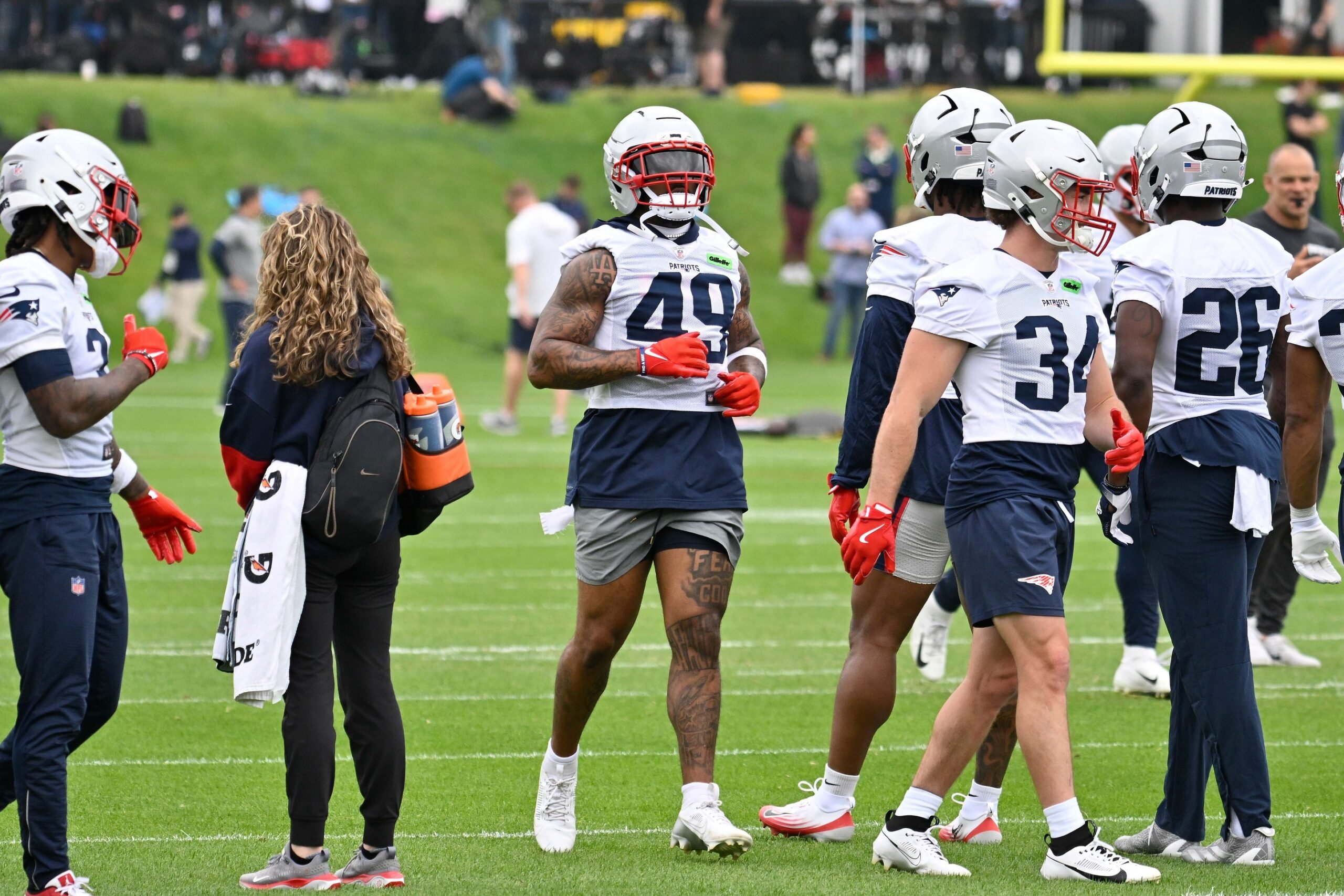 Jun 9, 2025; Foxborough, MA, USA; New England Patriots running back Trayveon Williams (49) is seen during the stretching period during minicamp at Gillette Stadium. Mandatory Credit: Eric Canha-Imagn Images
