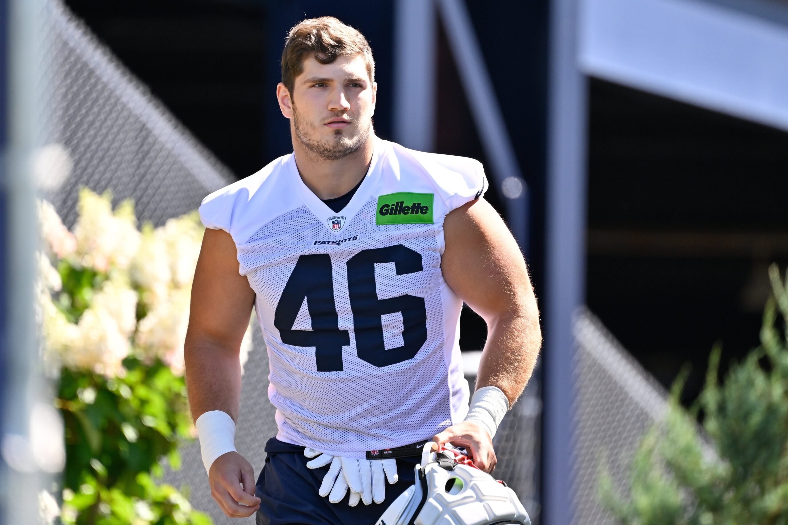 Jul 23, 2025; Foxborough, MA, USA; New England Patriots fullback Brock Lampe (46)  walks to the practice field for training camp at Gillette Stadium. Mandatory Credit: Eric Canha-Imagn Images
