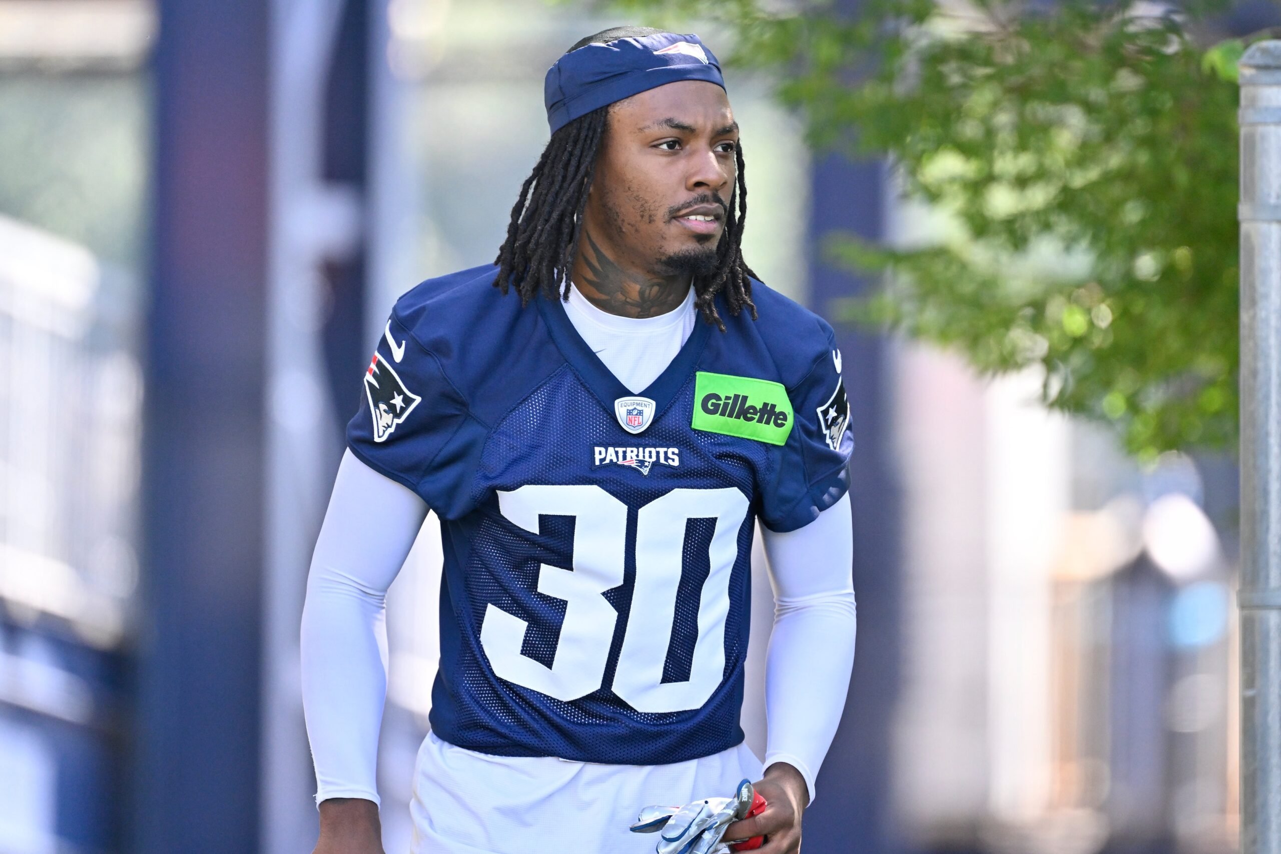 Jul 23, 2025; Foxborough, MA, USA; New England Patriots cornerback DJ James (30) walks to the practice field for training camp at Gillette Stadium. Mandatory Credit: Eric Canha-Imagn Images