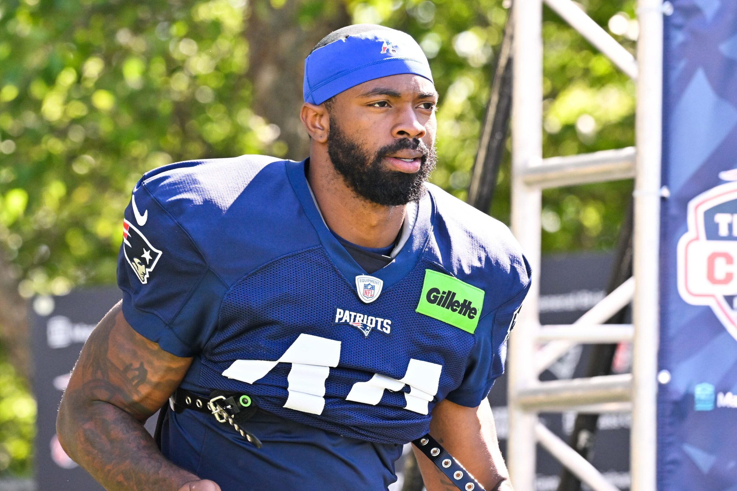 Jul 28, 2025; Foxborough, MA, USA; New England Patriots linebacker K'Lavon Chaisson (44) heads to the practice fields for training camp at Gillette Stadium. Mandatory Credit: Eric Canha-Imagn Images