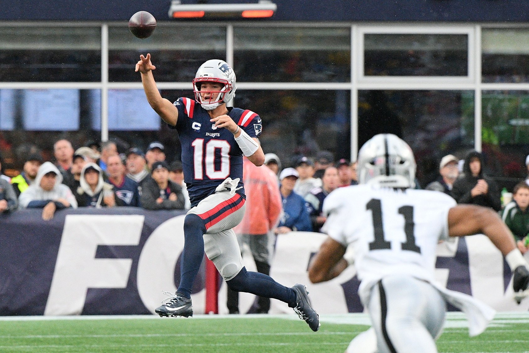 Sep 7, 2025; Foxborough, Massachusetts, USA; New England Patriots quarterback Drake Maye (10) throws the ball against the Las Vegas Raiders during the second half at Gillette Stadium. Mandatory Credit: Bob DeChiara-Imagn Images