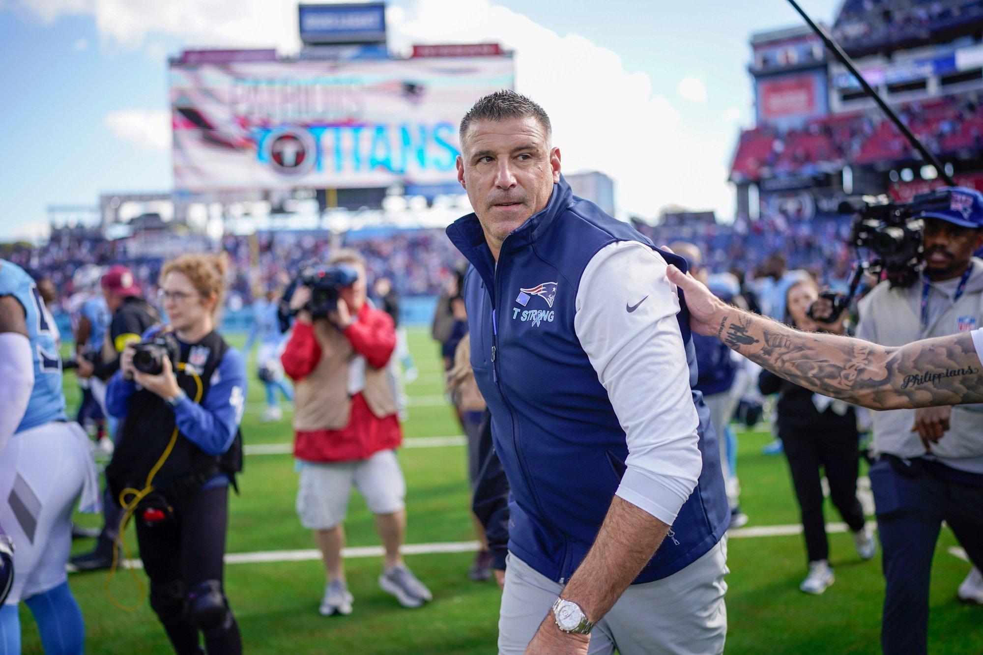 New England Patriots coach Mike Vrabel heads of the locker room after the game against the Tennessee Titans at Nissan Stadium in Nashville, Tenn., Sunday, Oct. 19, 2025.