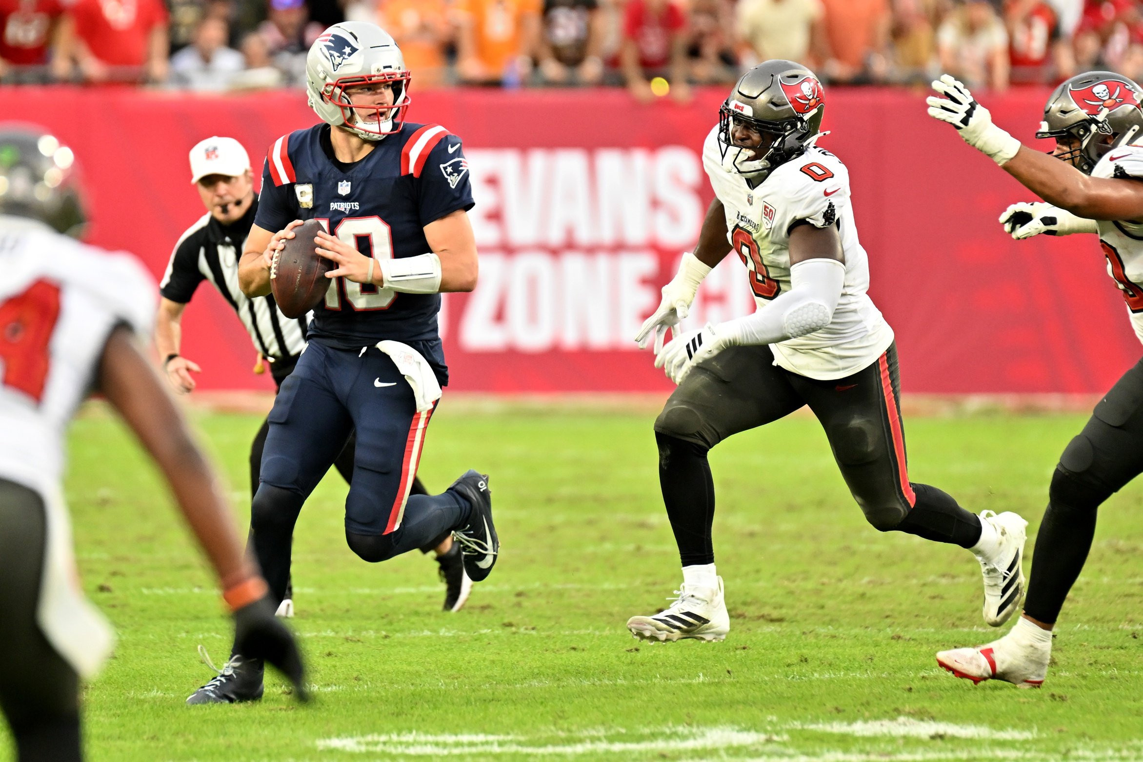 Nov 9, 2025; Tampa, Florida, USA; New England Patriots quarterback Drake Maye (10) runs in the pocket during the third quarter  against the Tampa Bay Buccaneers at Raymond James Stadium. Mandatory Credit: Jonathan Dyer-Imagn Images