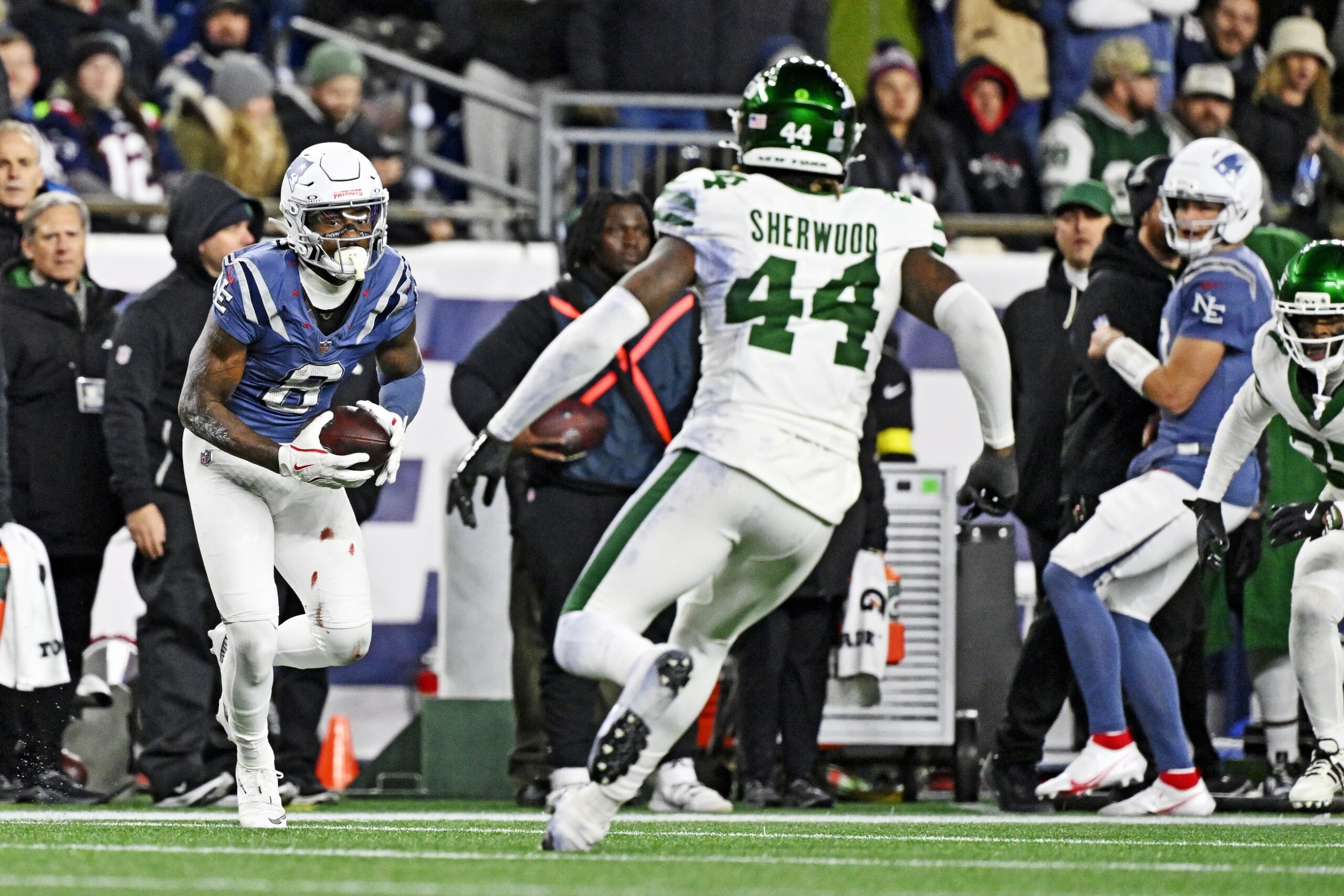 Nov 13, 2025; Foxborough, Massachusetts, USA; New England Patriots wide receiver Stefon Diggs (8) makes a catch during the second half against the New York Jets at Gillette Stadium. Mandatory Credit: Eric Canha-Imagn Images