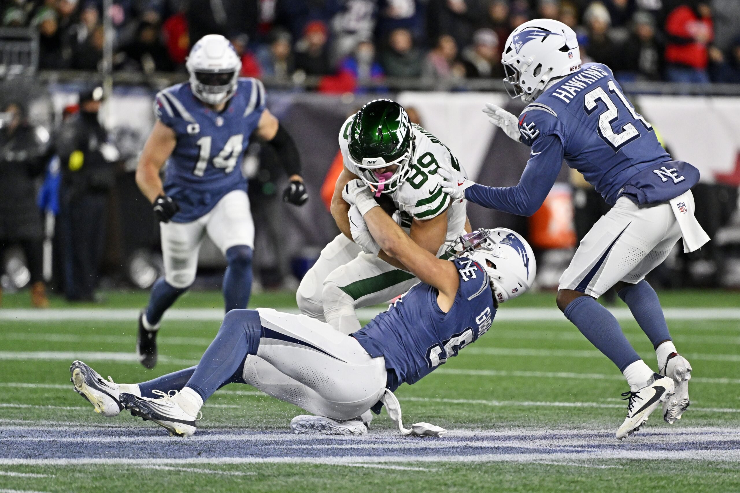 Nov 13, 2025; Foxborough, Massachusetts, USA; New York Jets tight end Jeremy Ruckert (89) is tackled by New England Patriots linebacker Jack Gibbens (51) during the second half at Gillette Stadium. Mandatory Credit: Eric Canha-Imagn Images