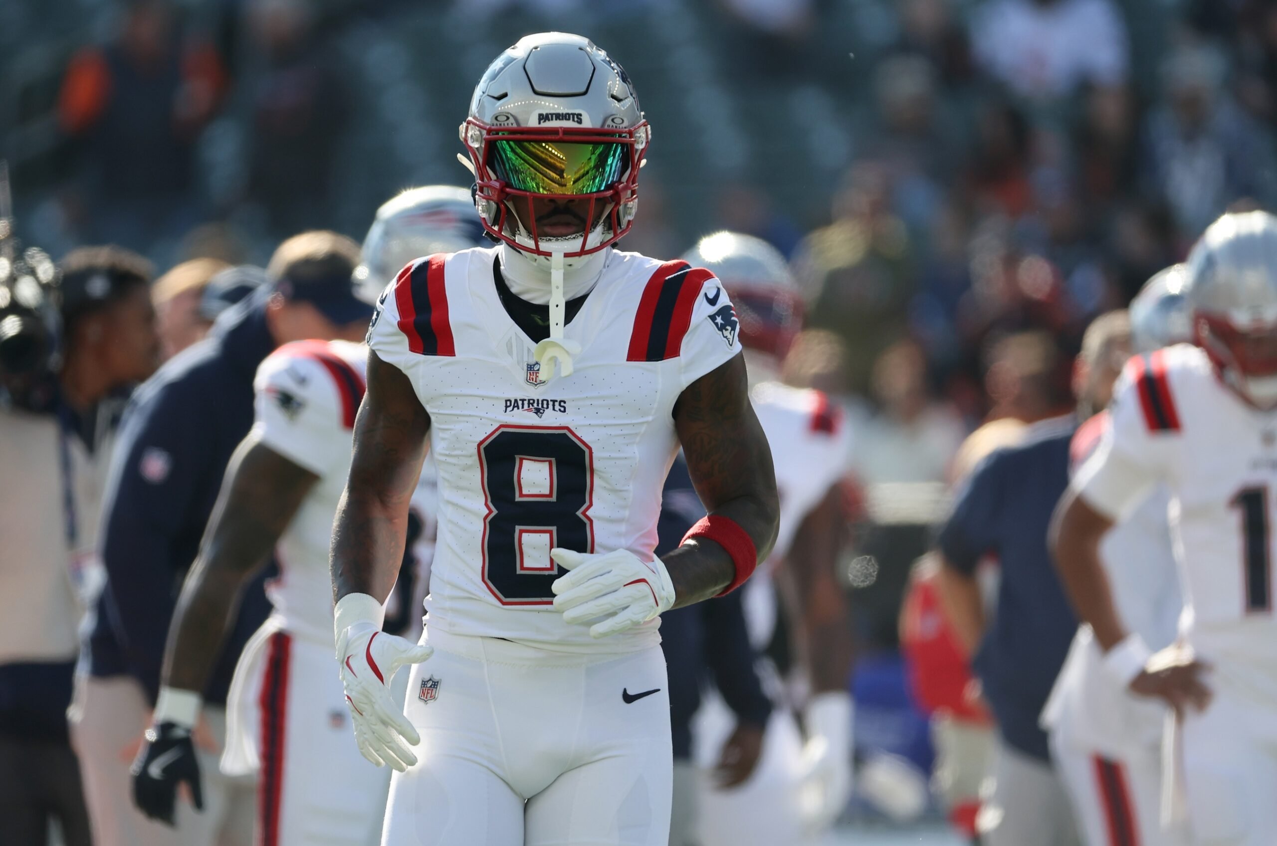 Nov 23, 2025; Cincinnati, Ohio, USA; New England Patriots wide receiver Stefon Diggs (8) warms up before a game against the Cincinnati Bengals at Paycor Stadium. Mandatory Credit: Joseph Maiorana-Imagn Images