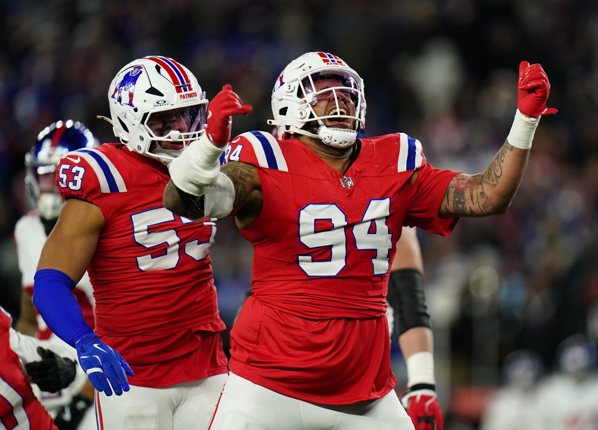 Dec 1, 2025; Foxborough, Massachusetts, USA; New England Patriots defensive tackle Cory Durden (94) celebrates after a play during the fourth quarter against the New York Giants at Gillette Stadium. Mandatory Credit: David Butler II-Imagn Images