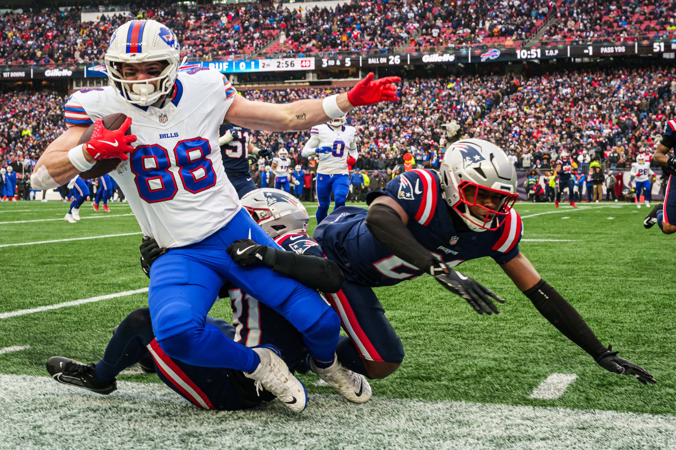 Dec 14, 2025; Foxborough, Massachusetts, USA; Buffalo Bills tight end Dawson Knox (88) runs the ball against the New England Patriots in the first quarter at Gillette Stadium. Mandatory Credit: David Butler II-Imagn Images