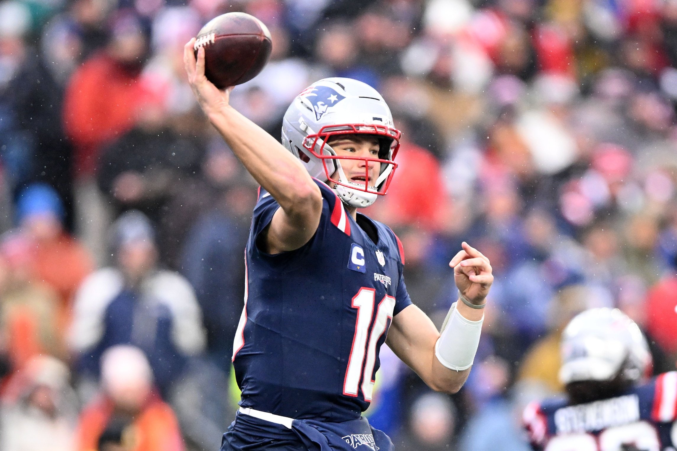 Dec 14, 2025; Foxborough, Massachusetts, USA; New England Patriots quarterback Drake Maye (10) passes against the Buffalo Bills during the second half at Gillette Stadium. Mandatory Credit: Brian Fluharty-Imagn Images