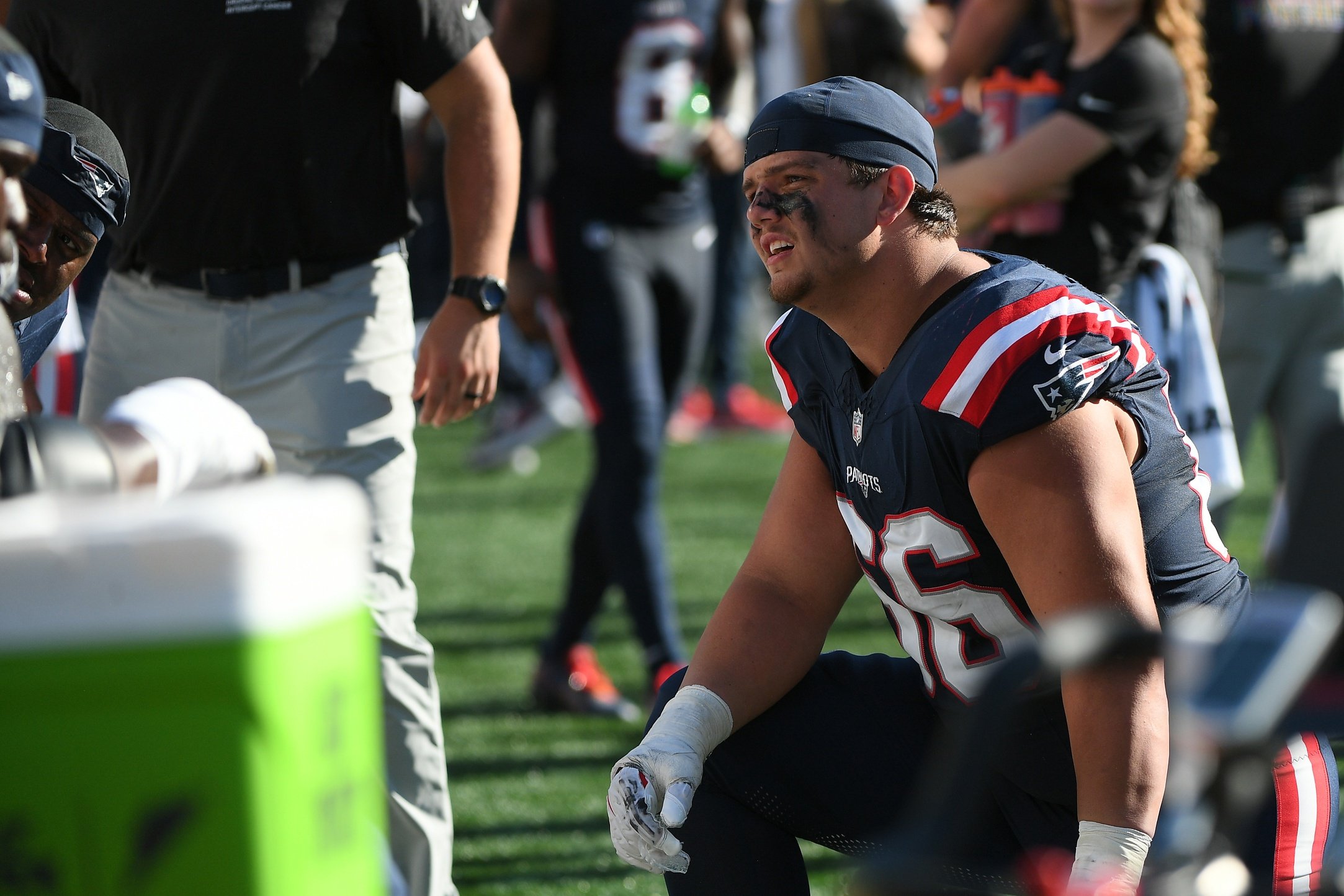 Sep 28, 2025; Foxborough, Massachusetts, USA; New England Patriots offensive tackle Will Campbell (66) talks to a teammate during the second half against the Carolina Panthers at Gillette Stadium. Mandatory Credit: Bob DeChiara-Imagn Images