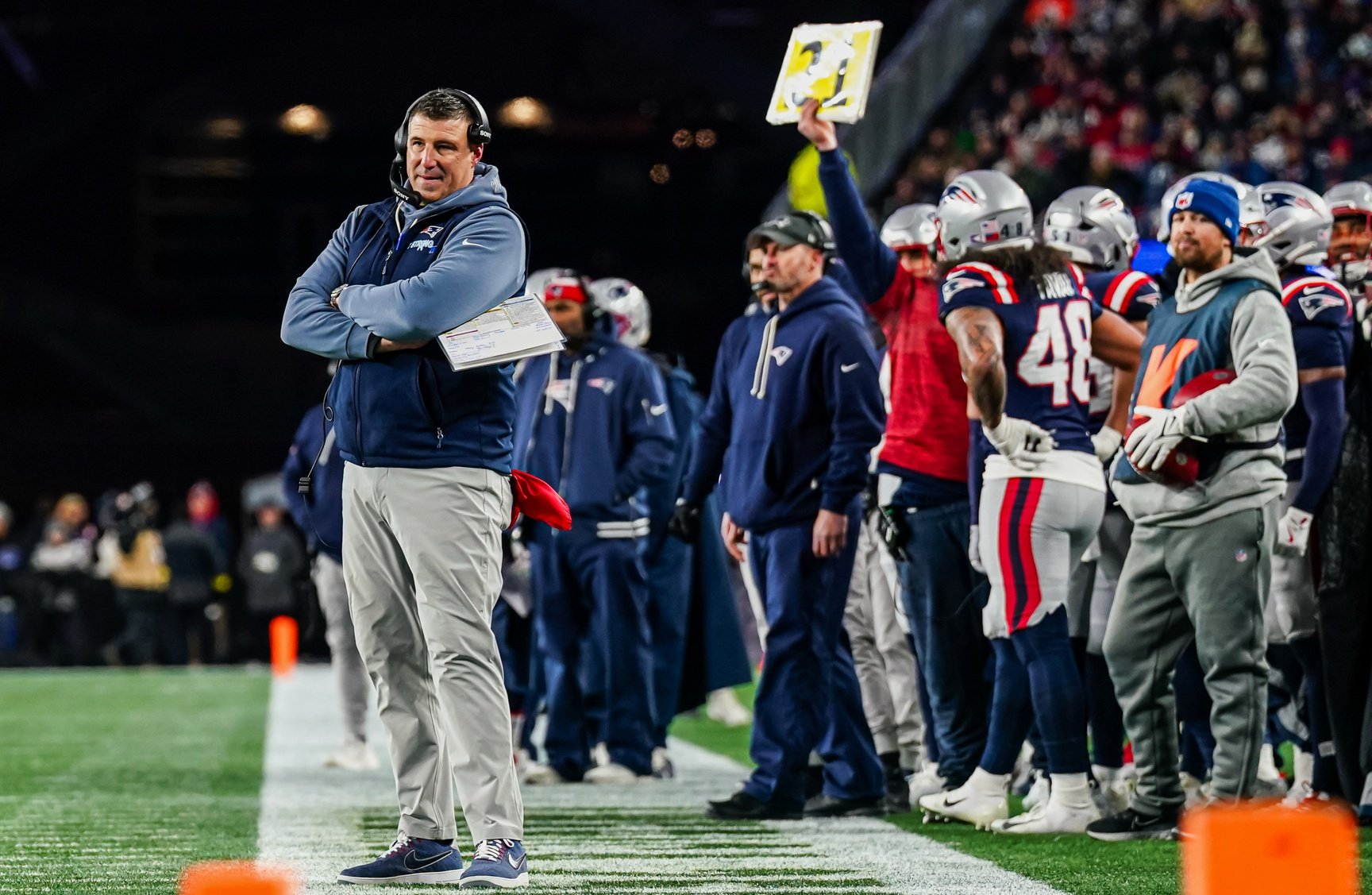 Jan 4, 2026; Foxborough, Massachusetts, USA; New England Patriots head coach Mike Vrabel watches game play against the Miami Dolphins during the second quarter at Gillette Stadium. Mandatory Credit: David Butler II-Imagn Images