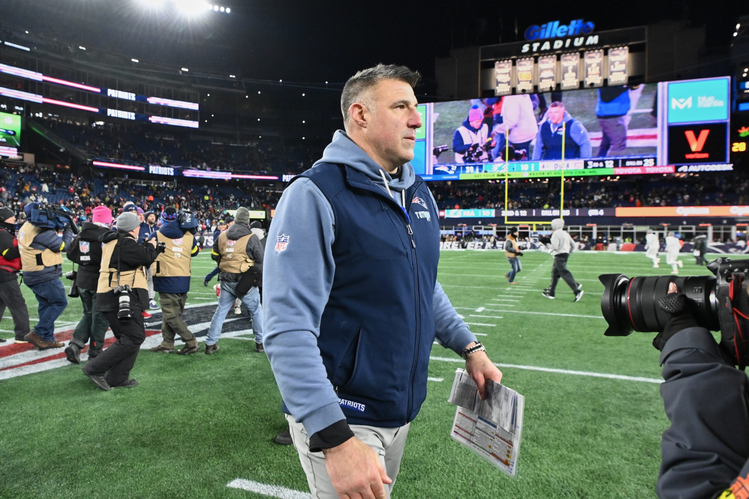 Jan 4, 2026; Foxborough, Massachusetts, USA; New England Patriots head coach Mike Vrabel walks on the field after the game against the Miami Dolphins at Gillette Stadium. Mandatory Credit: Brian Fluharty-Imagn Images