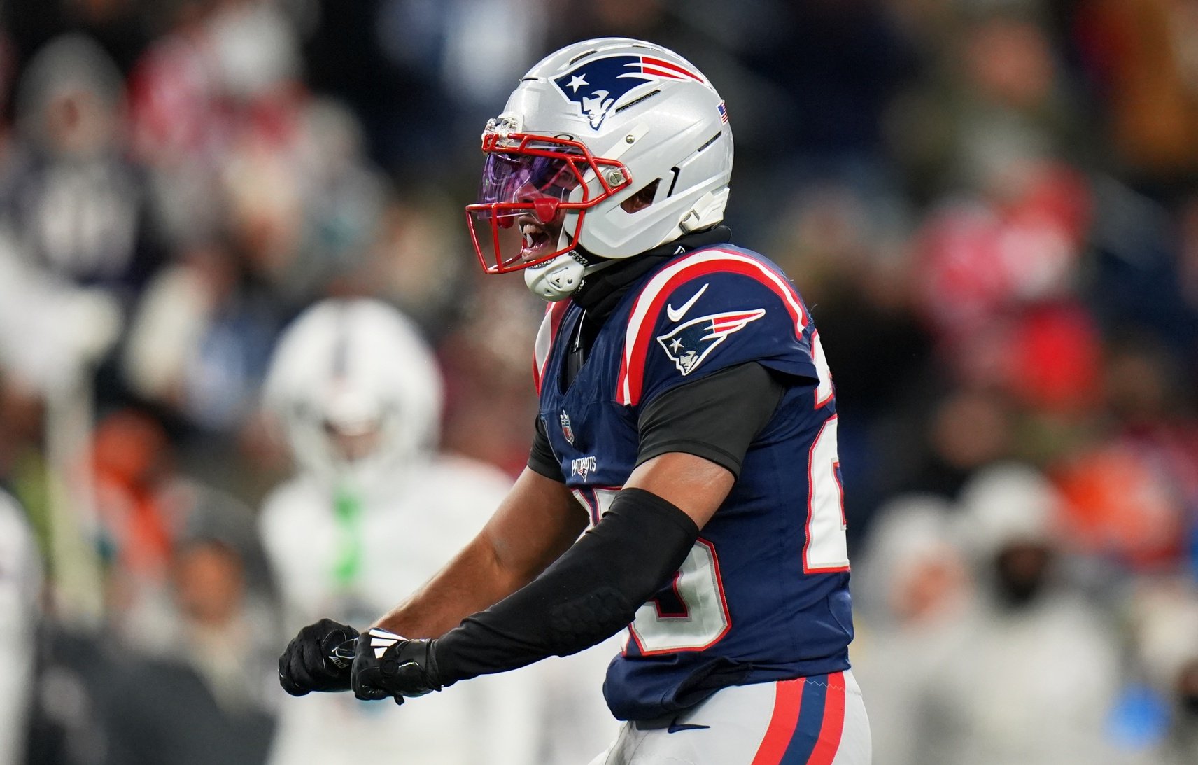 Jan 4, 2026; Foxborough, Massachusetts, USA; New England Patriots cornerback Marcus Jones (25) reacts against the Miami Dolphins during the second half at Gillette Stadium. Mandatory Credit: David Butler II-Imagn Images