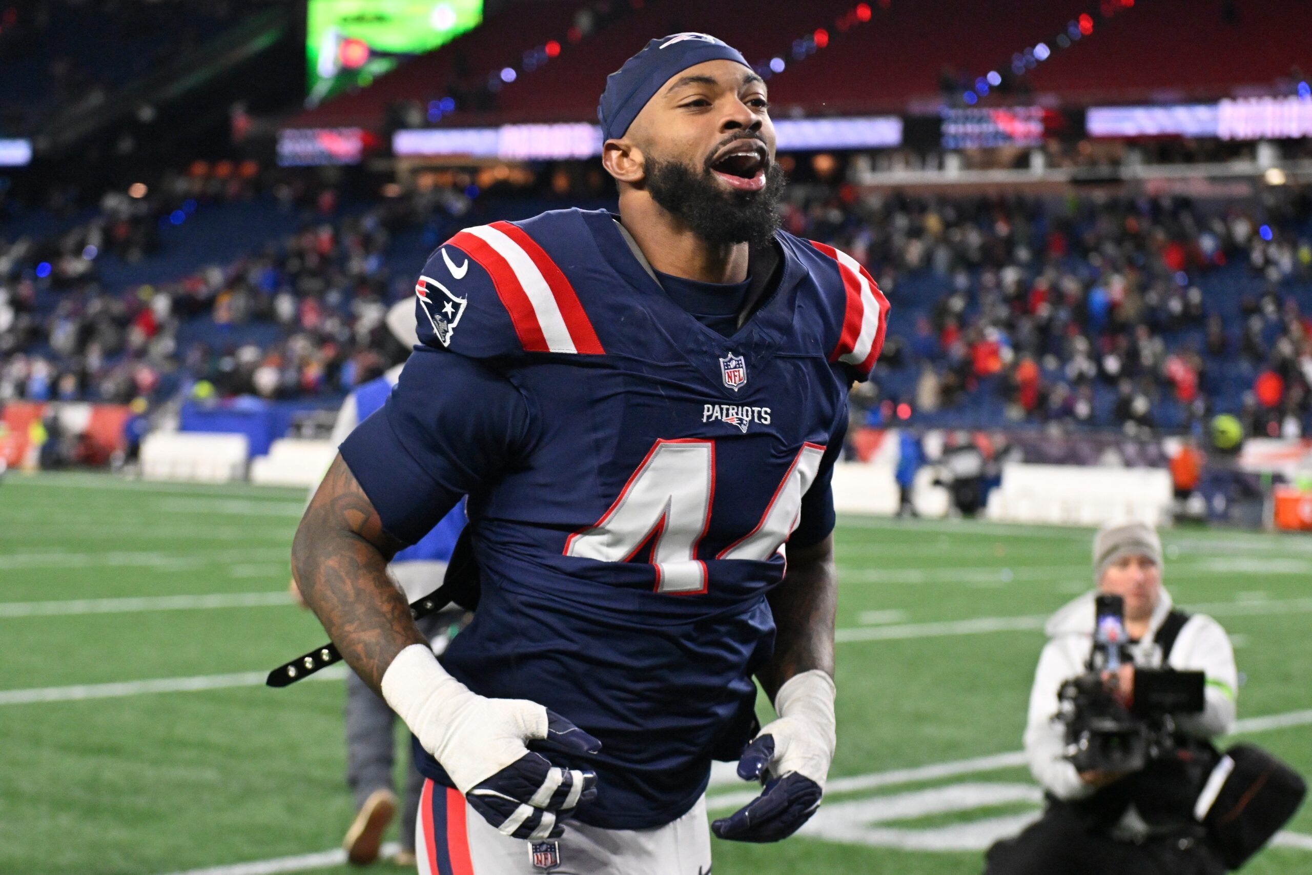 Jan 11, 2026; Foxborough, MA, USA; New England Patriots linebacker K'Lavon Chaisson (44) jogs off the field after defeating the Los Angeles Chargers in an AFC Wild Card Round game at Gillette Stadium. Mandatory Credit: Eric Canha-Imagn Images