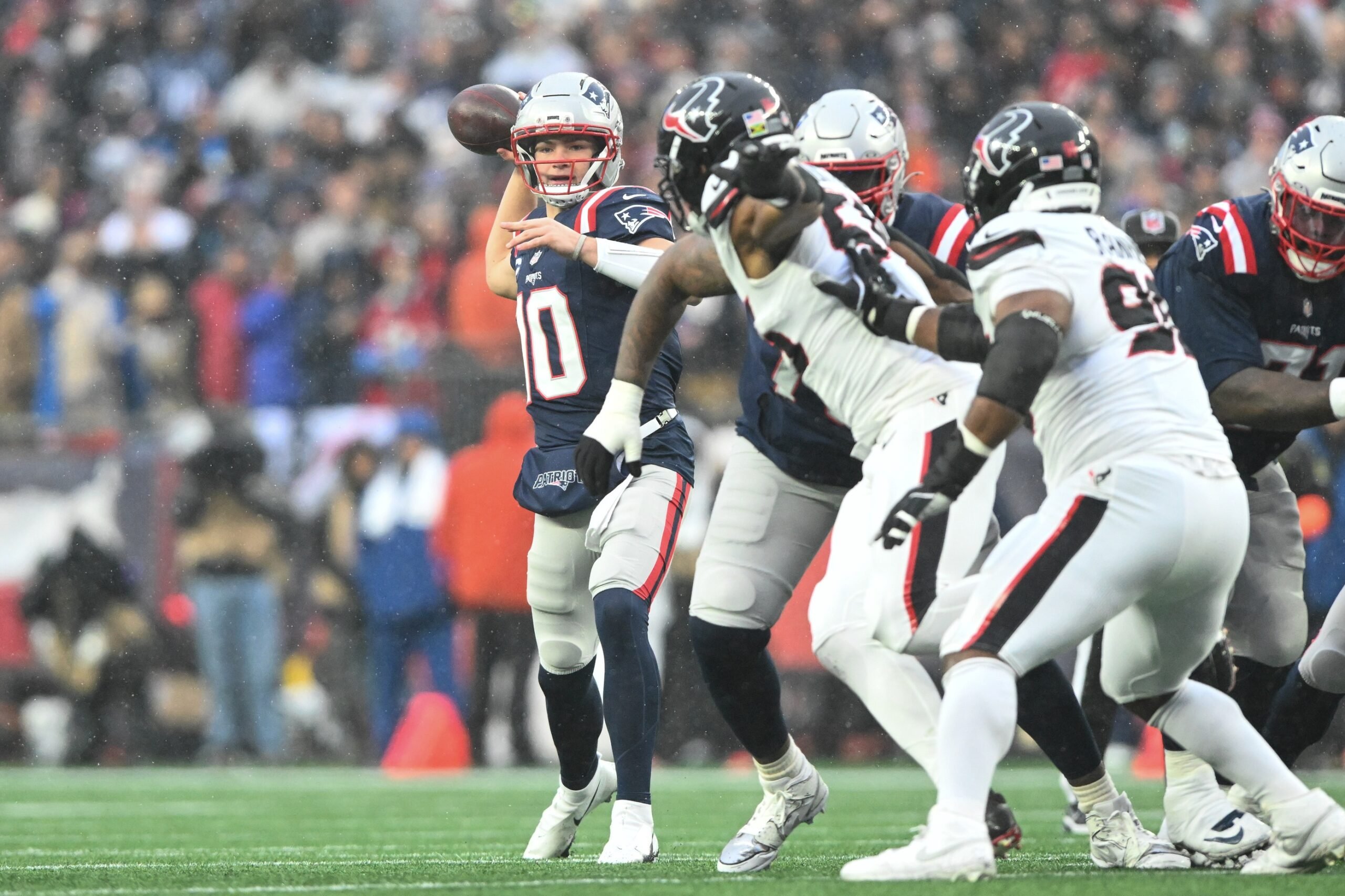Jan 18, 2026; Foxborough, MA, USA; New England Patriots quarterback Drake Maye (10) throws in the first quarter in an AFC Divisional Round game against the Houston Texans at Gillette Stadium. Mandatory Credit: Brian Fluharty-Imagn Images