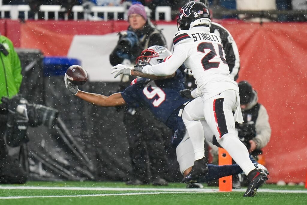 Jan 18, 2026; Foxborough, MA, USA; England Patriots wide receiver Kayshon Boutte (9) catches the ball for a touchdown in the fourth quarter against the Houston Texans in an AFC Divisional Round game at Gillette Stadium. Mandatory Credit: David Butler II-Imagn Images