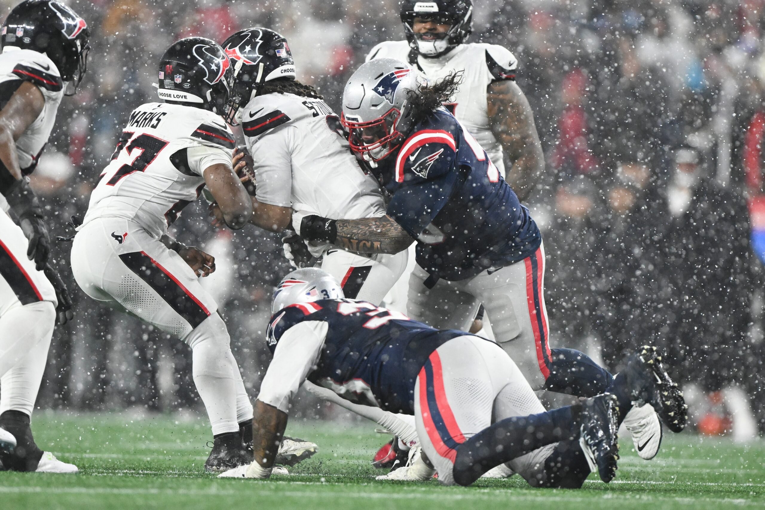 Jan 18, 2026; Foxborough, MA, USA; New England Patriots defensive lineman Khyiris Tonga (95) sacks Houston Texans quarterback C.J. Stroud (7) in the fourth quarter in an AFC Divisional Round game at Gillette Stadium. Mandatory Credit: Brian Fluharty-Imagn Images
