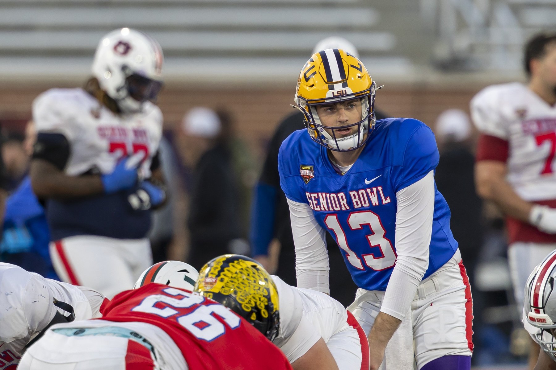 Jan 28, 2026; Mobile, AL, USA; American Team quarterback Garrett Nussmeier (13) of LSU runs a play during American Senior Bowl practice at Hancock Whitney Stadium. Mandatory Credit: Vasha Hunt-Imagn Images