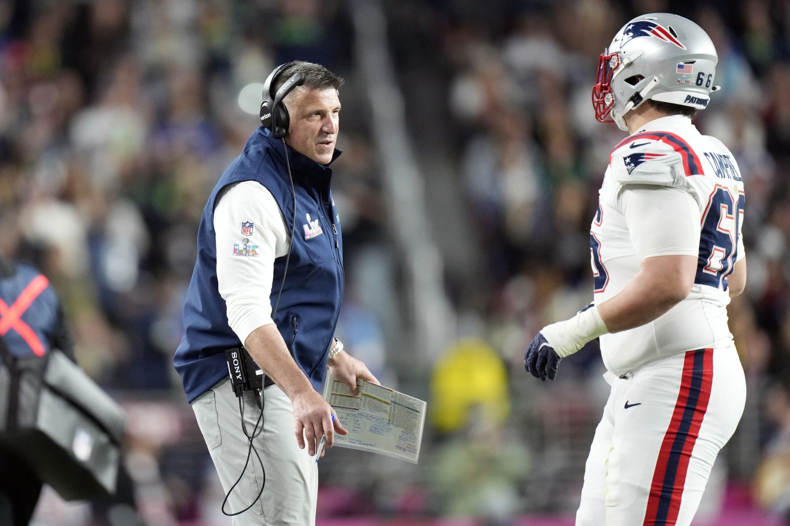 Feb 8, 2026; Santa Clara, CA, USA; New England Patriots head coach Mike Vrabel talks with offensive tackle Will Campbell (66) during the third quarter against the Seattle Seahawks in Super Bowl LX at Levi's Stadium. Mandatory Credit: Kyle Terada-Imagn Images