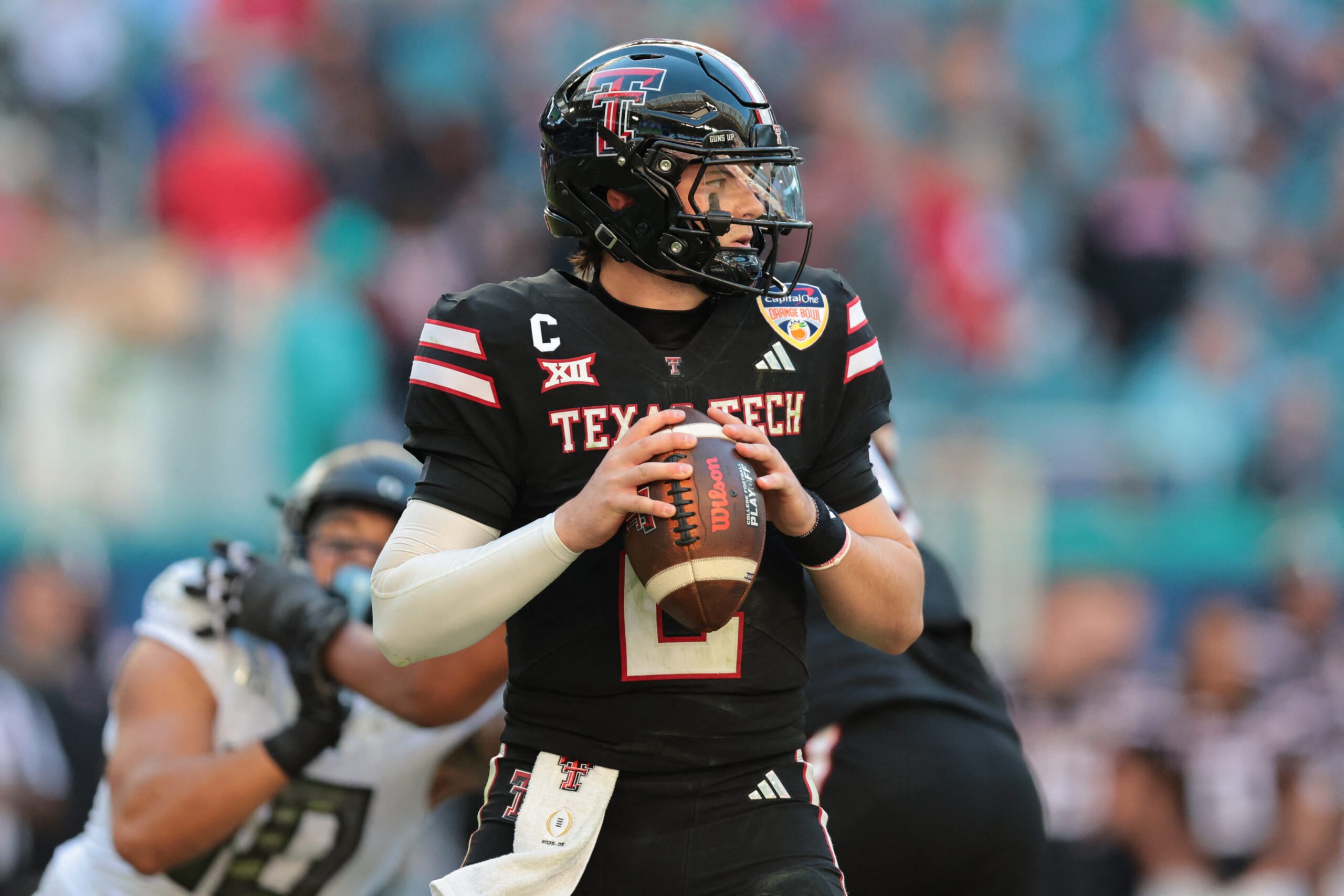 Jan 1, 2026; Miami Gardens, FL, USA; Texas Tech Red Raiders quarterback Behren Morton (2) stands in the pocket against the Oregon Ducks during the second half of the 2025 Orange Bowl and quarterfinal game of the College Football Playoff at Hard Rock Stadium. Mandatory Credit: Sam Navarro-Imagn Images