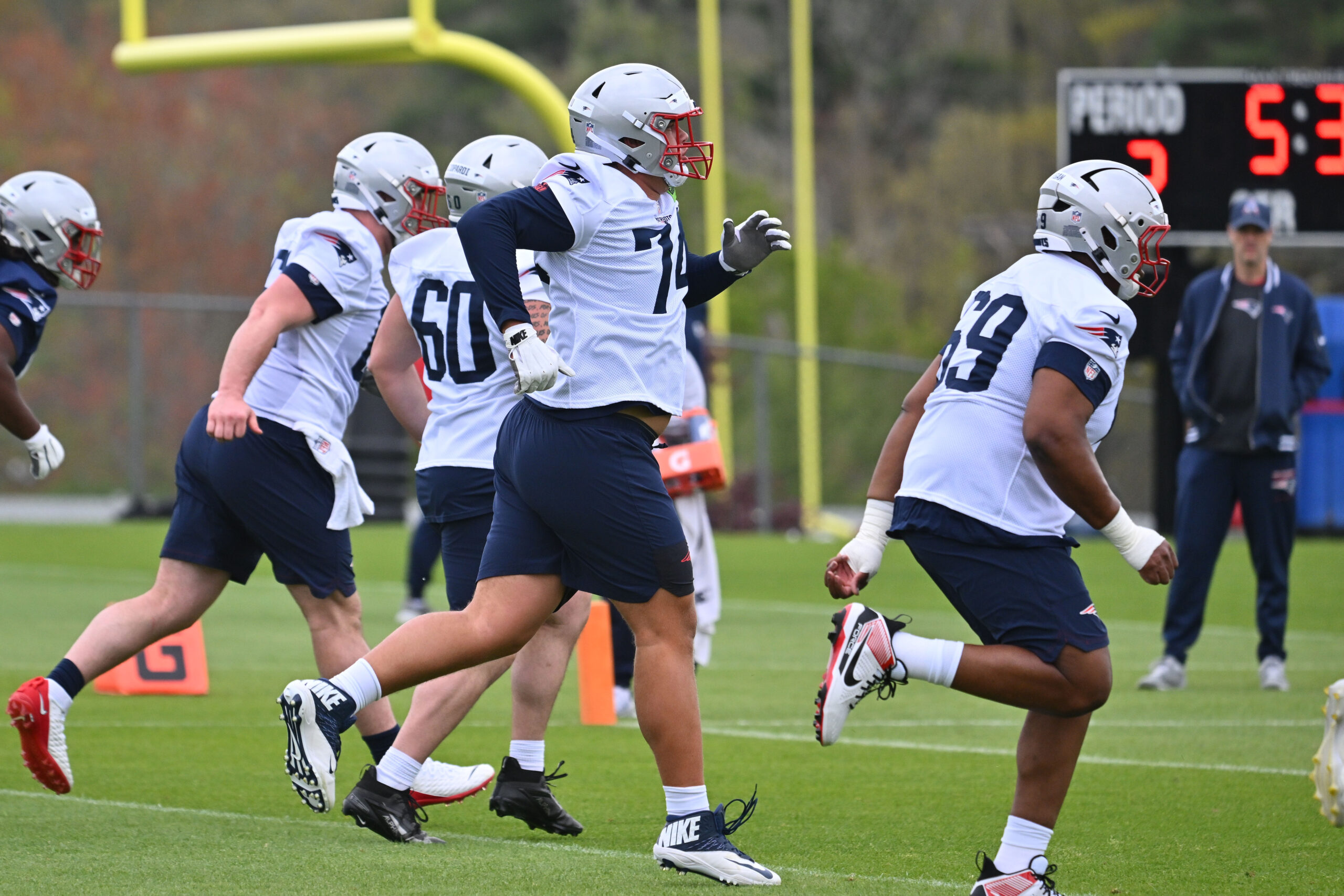 May 9, 2026; Foxborough, MA, USA; New England Patriots tackle Caleb Lomu (74) warms up during the New England Patriots rookie camp at Gillette Stadium. Mandatory Credit: Eric Canha-Imagn Images