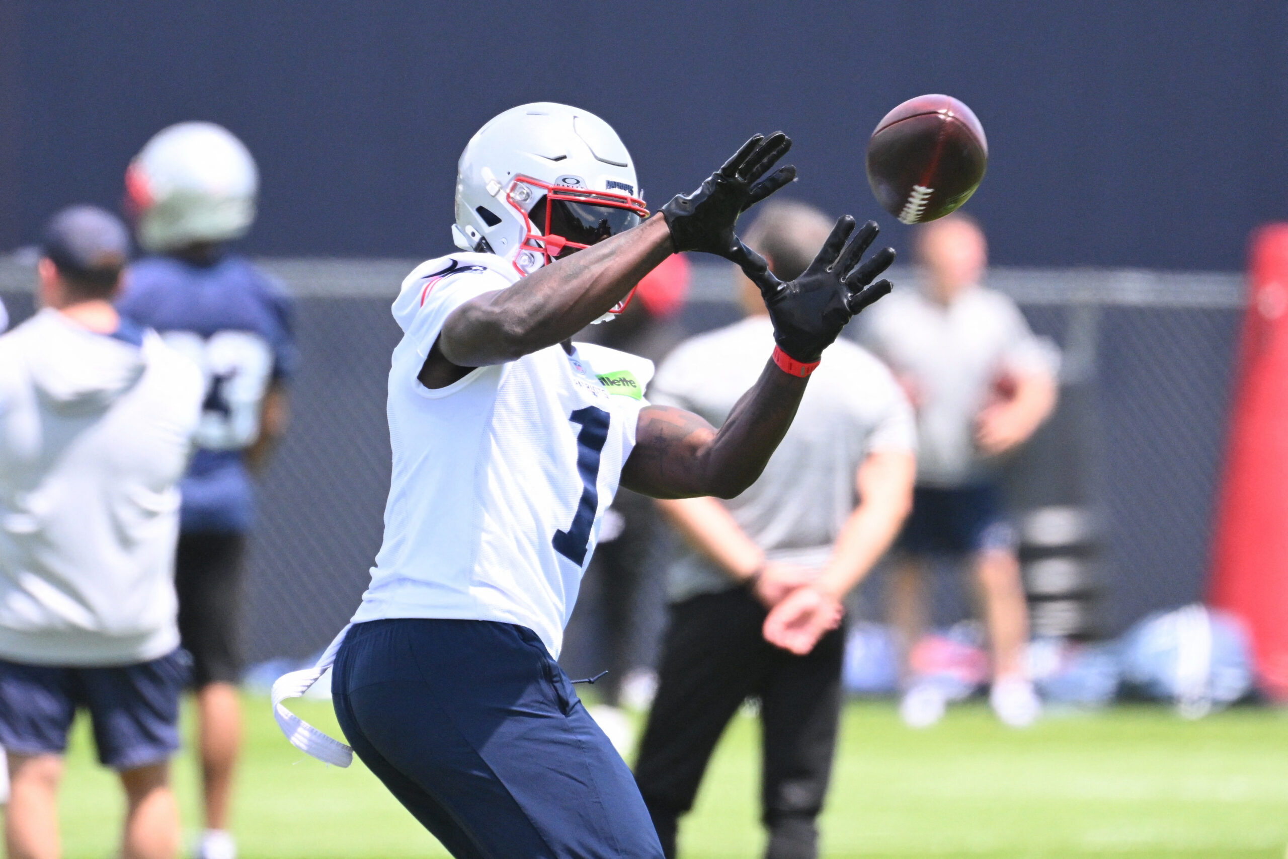 Jun 2, 2026; Foxborough, MA, USA; New England Patriots wide receiver A.J. Brown (1) makes a catch during the team's OTA at Gillette Stadium. Mandatory Credit: Eric Canha-Imagn Images