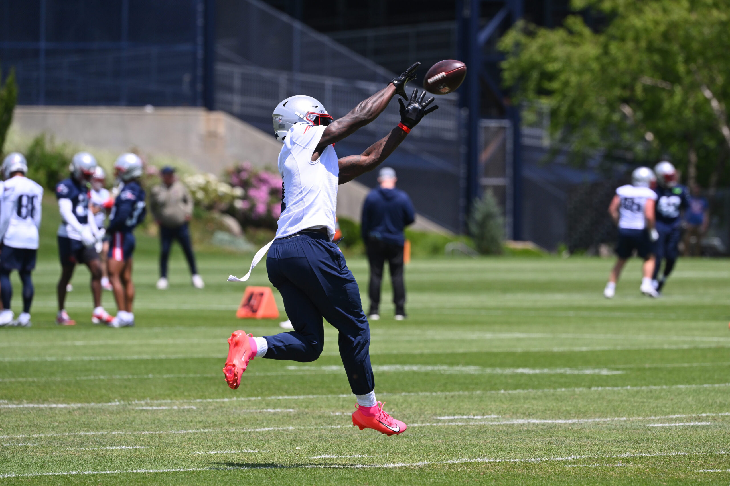 Jun 2, 2026; Foxborough, MA, USA; New England Patriots wide receiver A.J. Brown (1) makes a catch during the team's OTA at Gillette Stadium. Mandatory Credit: Eric Canha-Imagn Images