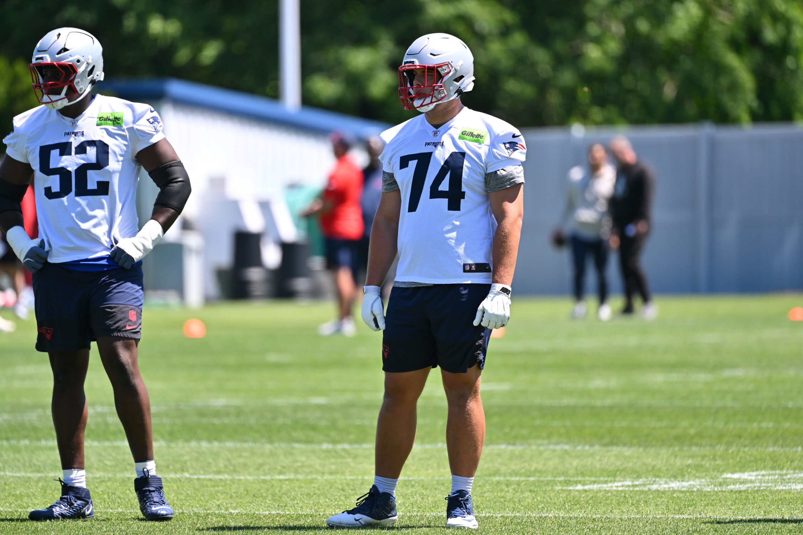 Jun 9, 2026; Foxborough, MA, USA; New England Patriots tackle Caleb Lomu (74) looks on at minicamp at Gillette Stadium. Mandatory Credit: Eric Canha-Imagn Images