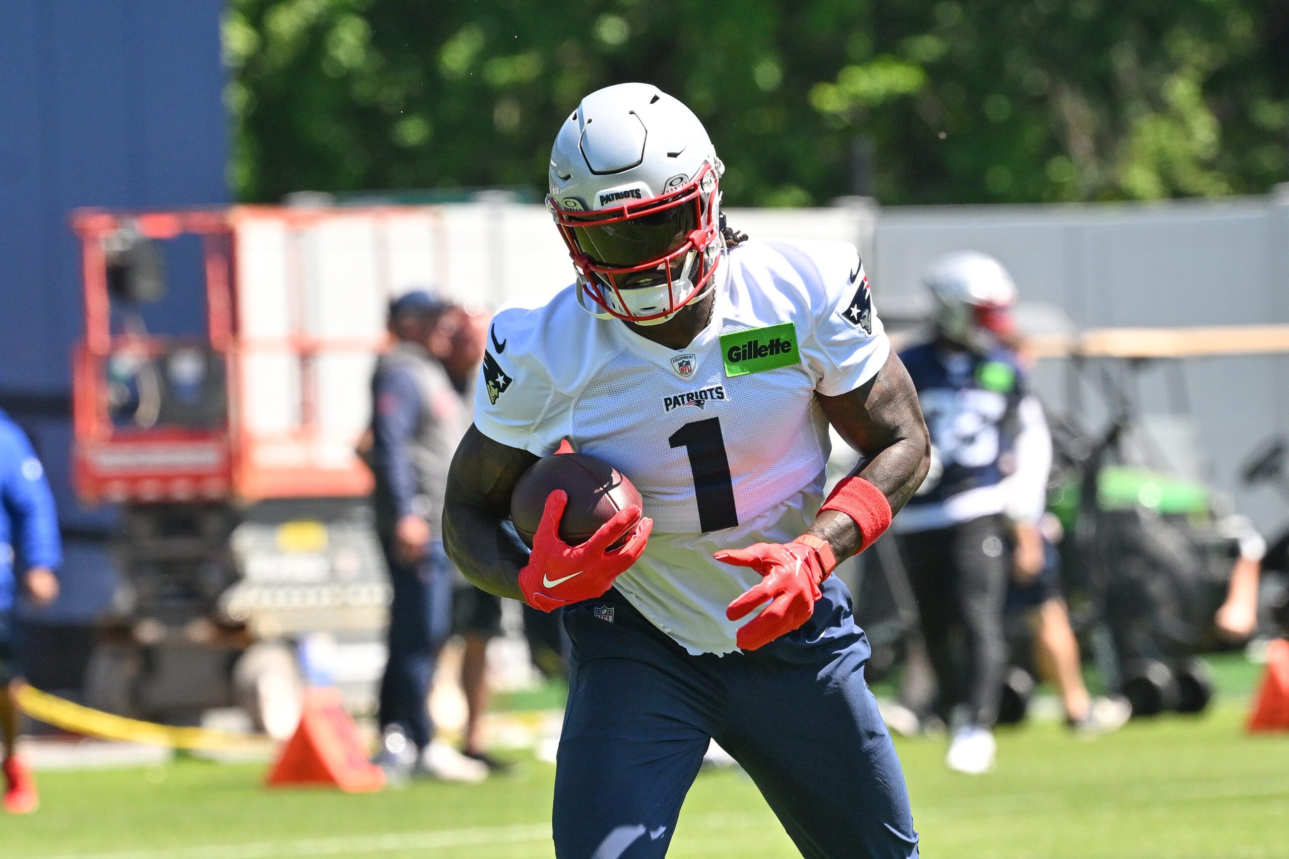 Jun 9, 2026; Foxborough, MA, USA; New England Patriots wide receiver A.J. Brown (1) runs after the catch at minicamp at Gillette Stadium. Mandatory Credit: Eric Canha-Imagn Images