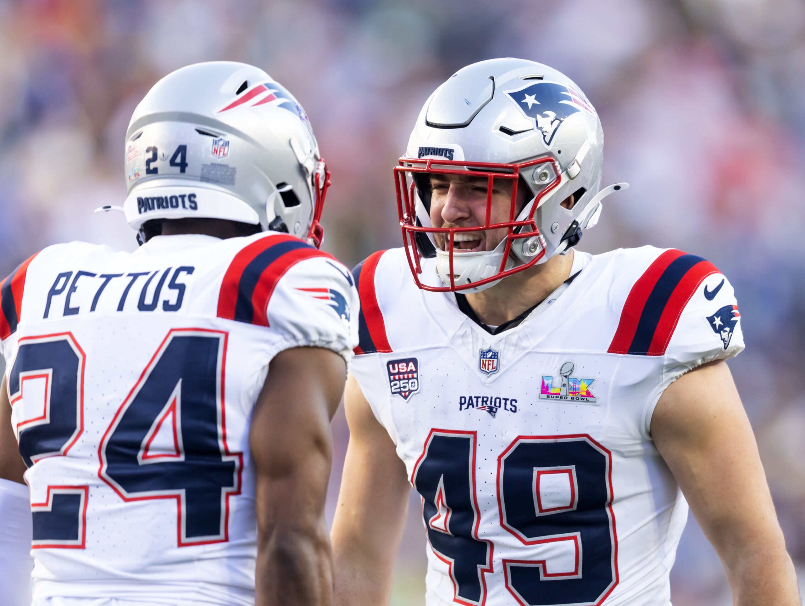 Feb 8, 2026; Santa Clara, CA, USA; New England Patriots safety Dell Pettus (24) and linebacker Chad Muma (49) celebrate after a play against the Seattle Seahawks during Super Bowl LX at Levi's Stadium. Mandatory Credit: Mark J. Rebilas-Imagn Images