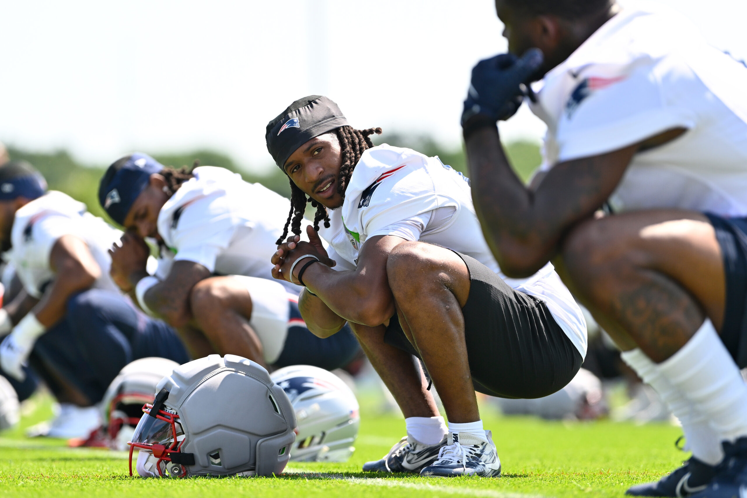 Jul 25, 2026; Foxborough, MA, USA; New England Patriots wide receiver Kyle Williams (18) stretches at training camp at Gillette Stadium. Mandatory Credit: Eric Canha-Imagn Images