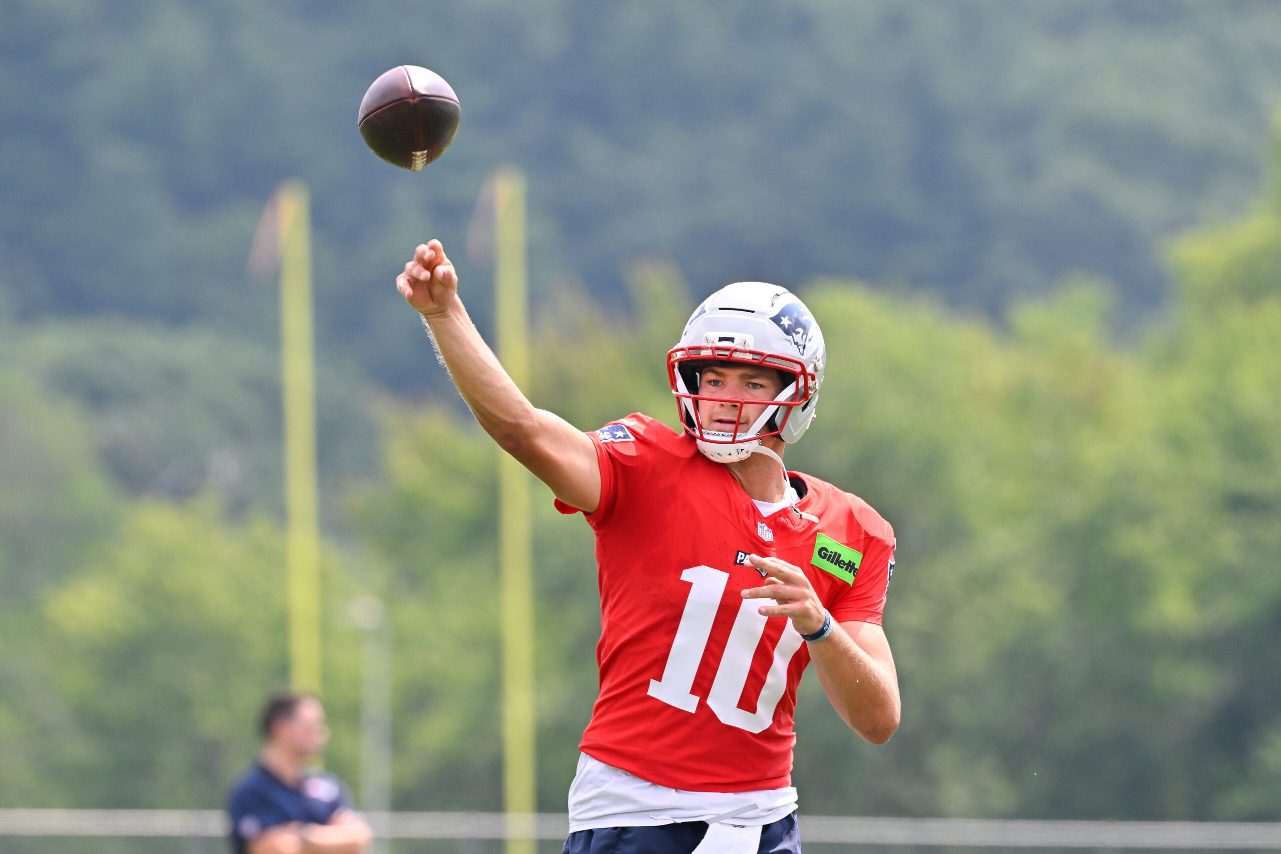 Jul 28, 2026; Foxborough, MA, USA; New England Patriots quarterback Drake Maye (10) throws a pass during training camp at Gillette Stadium. Mandatory Credit: Eric Canha-Imagn Images