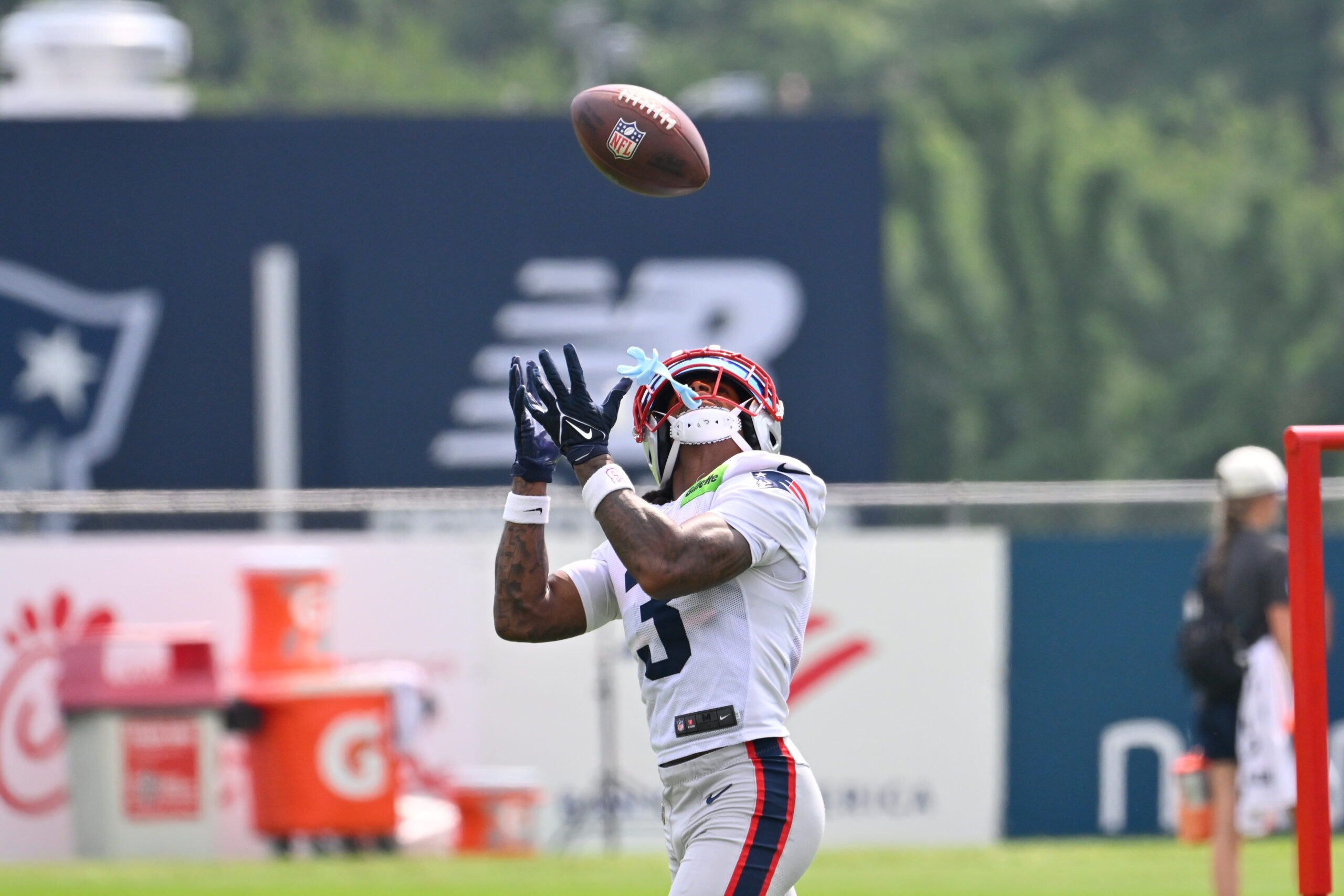 Jul 28, 2026; Foxborough, MA, USA; New England Patriots wide receiver DeMario Douglas (3) makes a catch during training camp at Gillette Stadium. Mandatory Credit: Eric Canha-Imagn Images